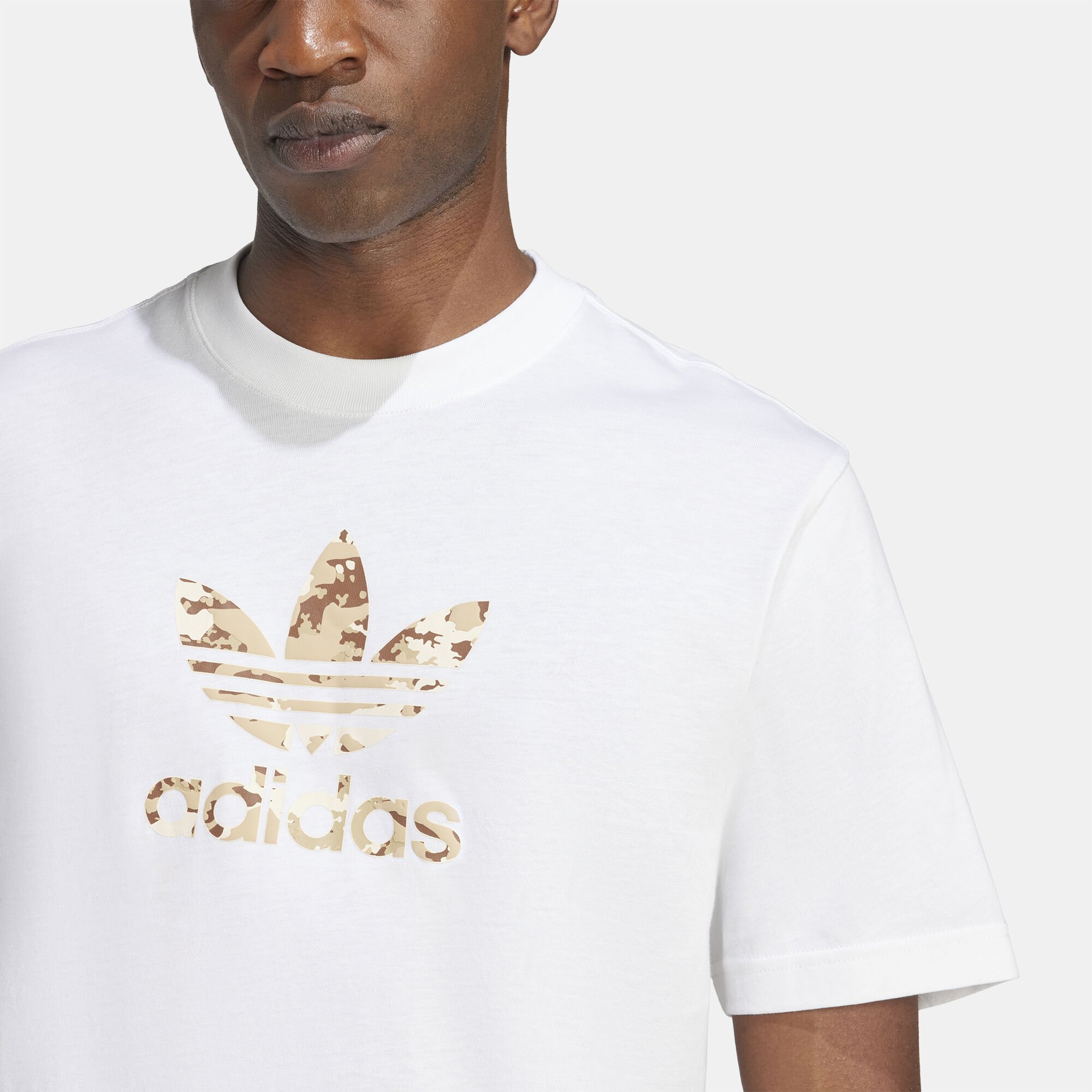 White adidas t shirt with gold logo store