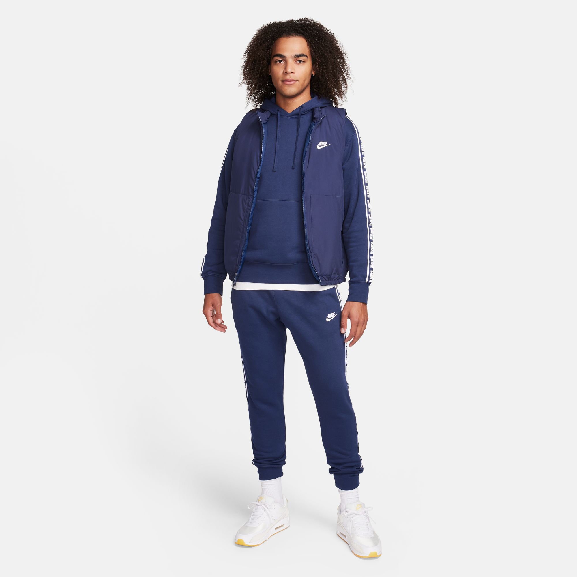 Nike sportswear fleece graphic tracksuit deals