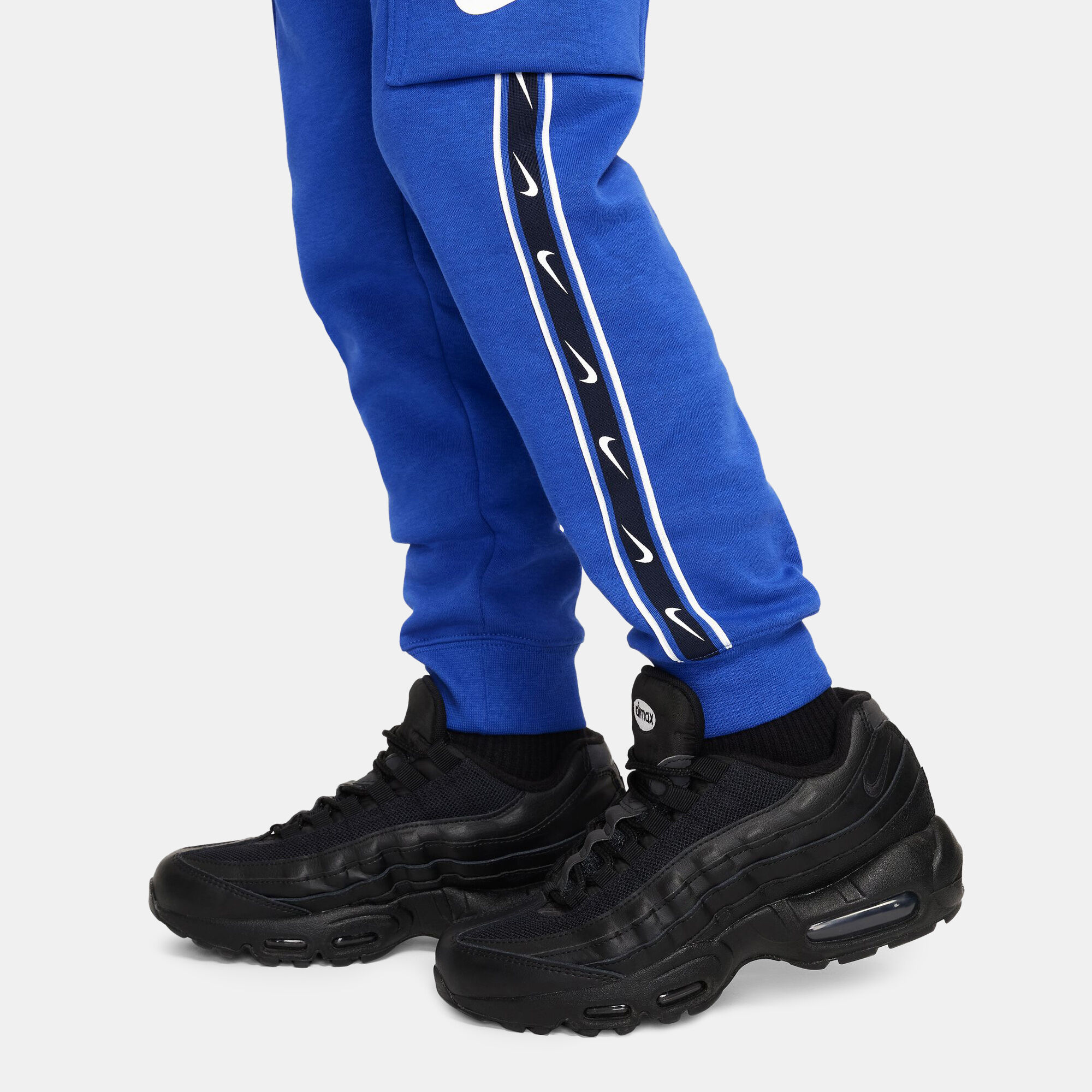 Nike tape clearance track pants blue