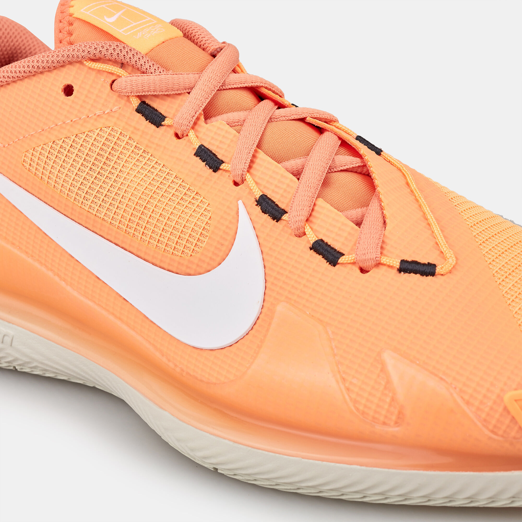 Nike tennis shoes orange deals