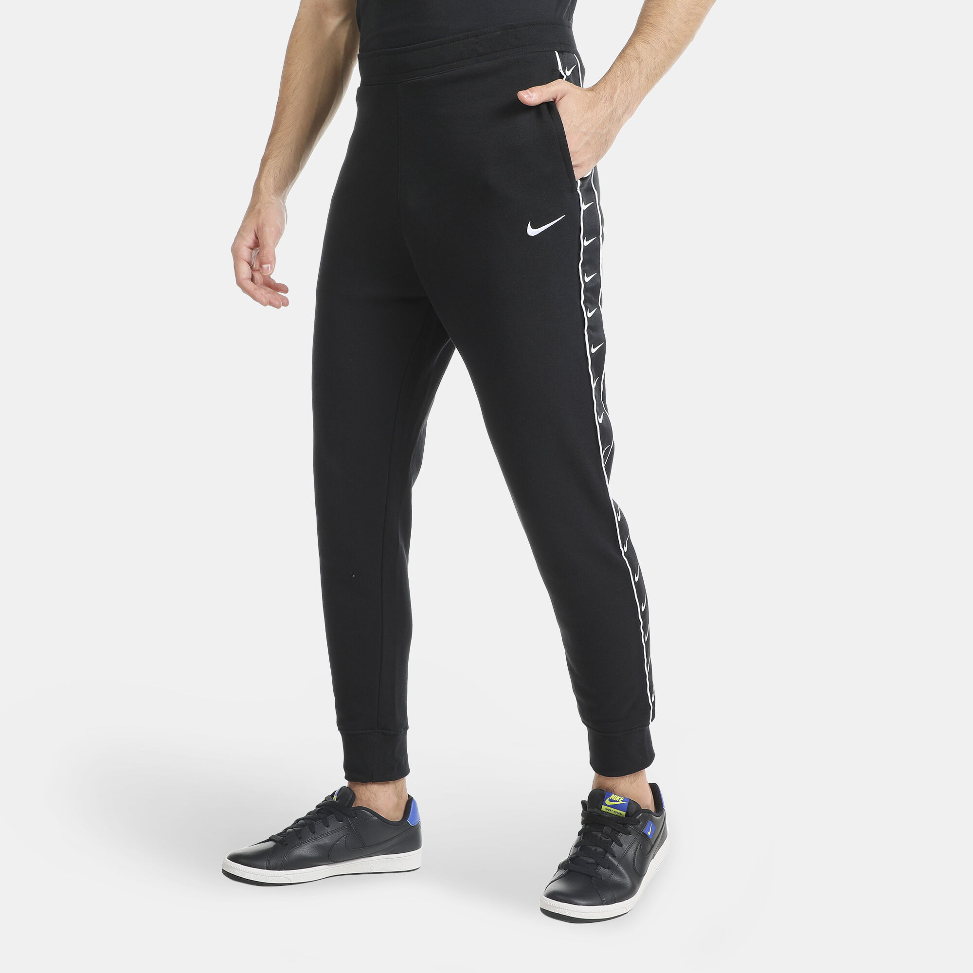Nike swoosh store taped joggers