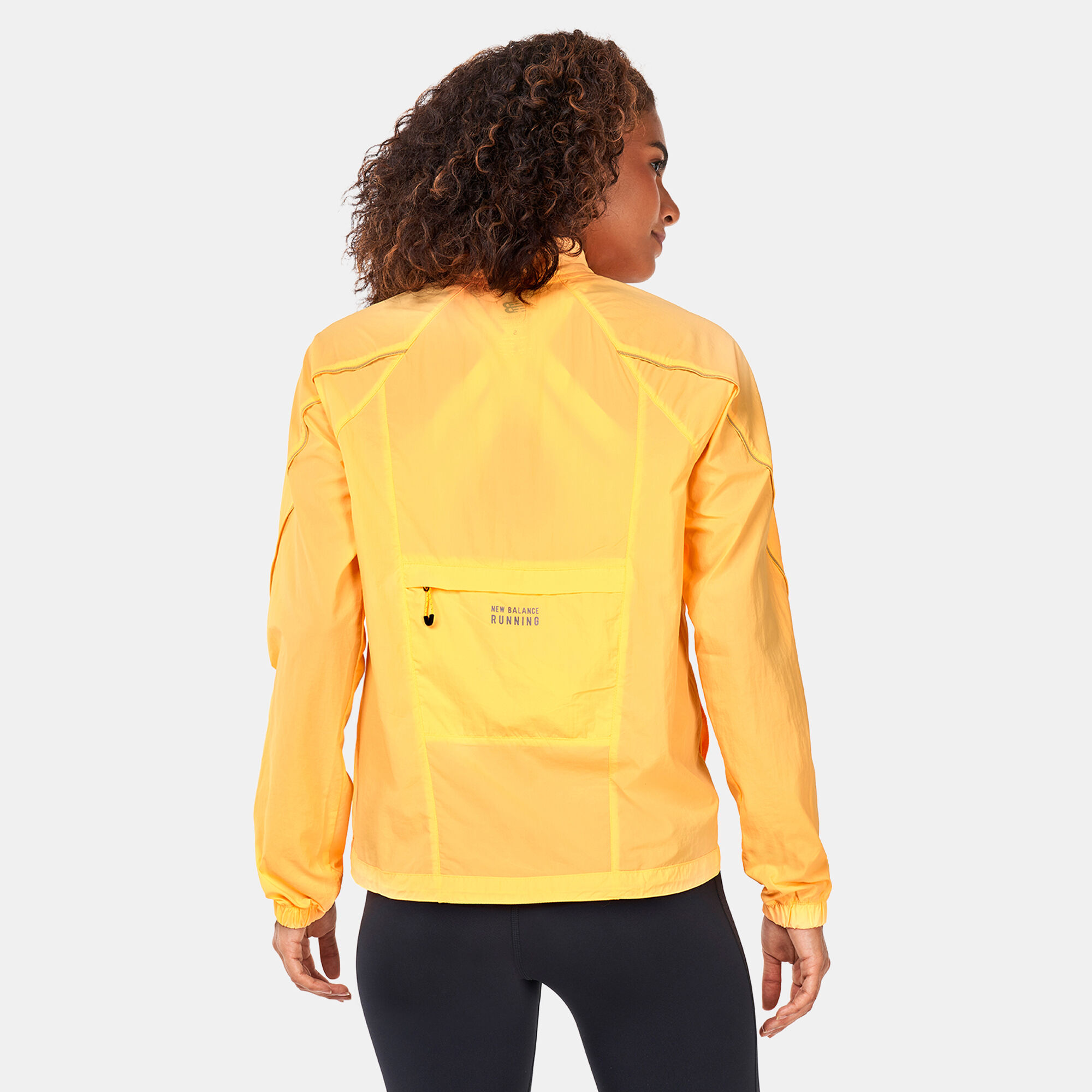 Women s Impact Run Light Pack Jacket Yellow New Balance in Kuwait SSS