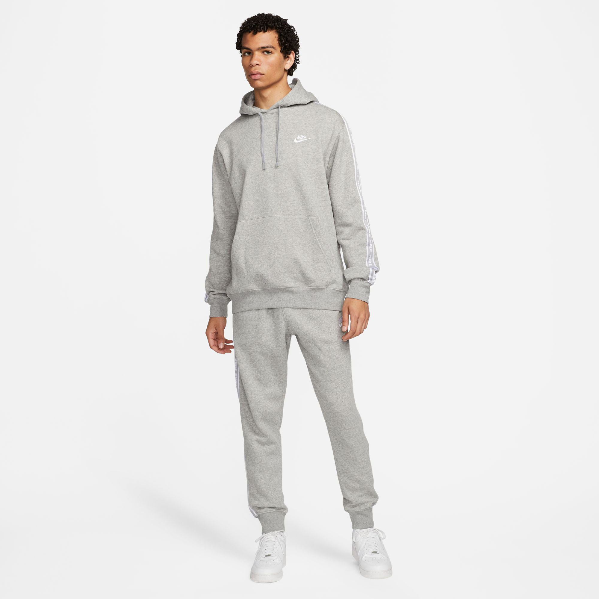 Nike graphic tracksuit discount