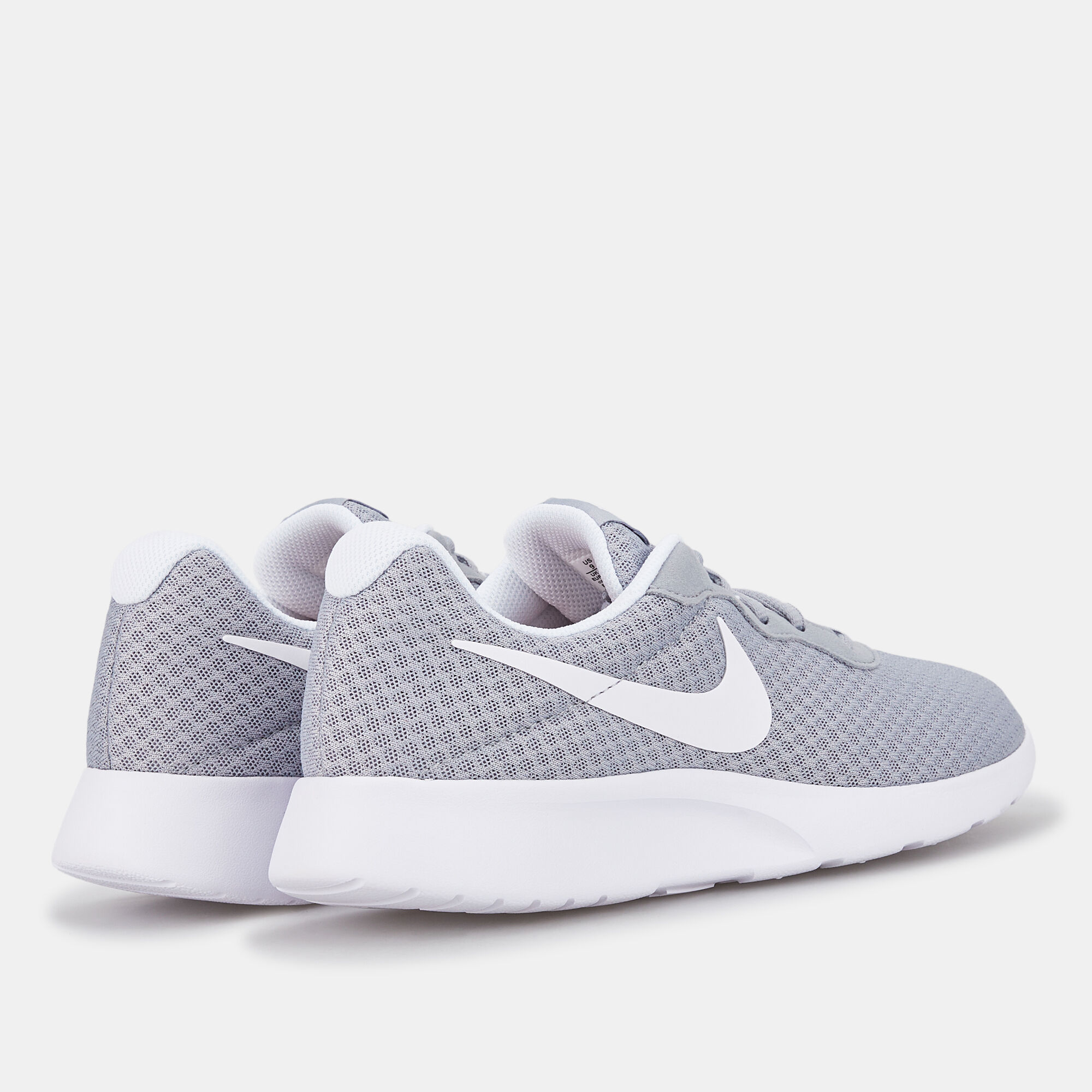 Women's nike tanjun beige 2025