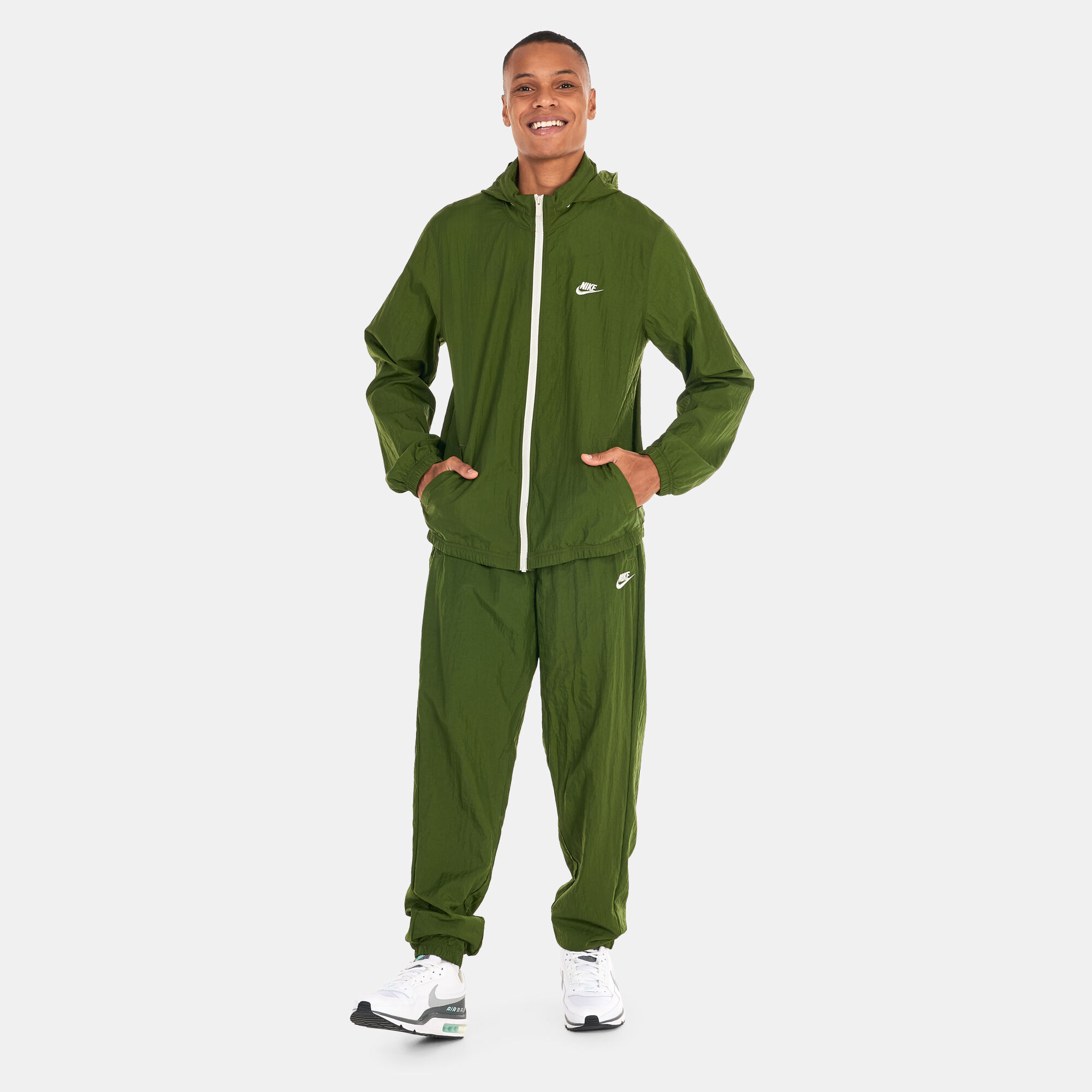 Men s Sportswear SPE Basic Woven Tracksuit Green Nike in Kuwait SSS