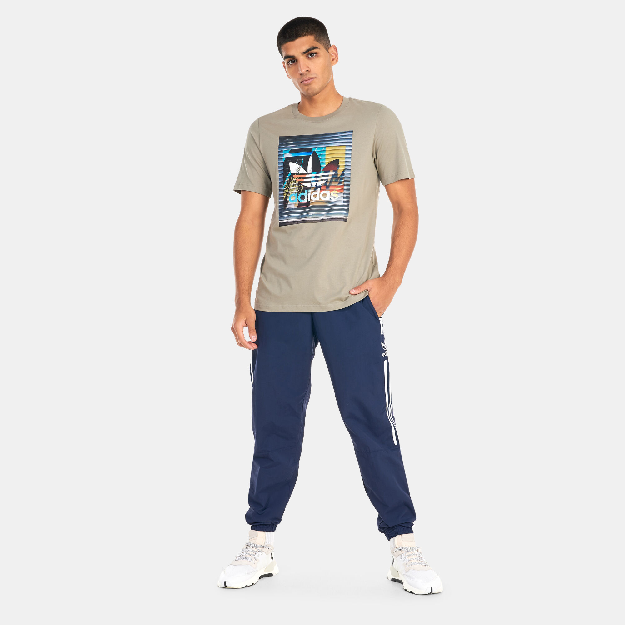 Buy adidas Originals Men s Adicolor Classics Lock Up Trefoil Track Pants Blue in Kuwait SSS