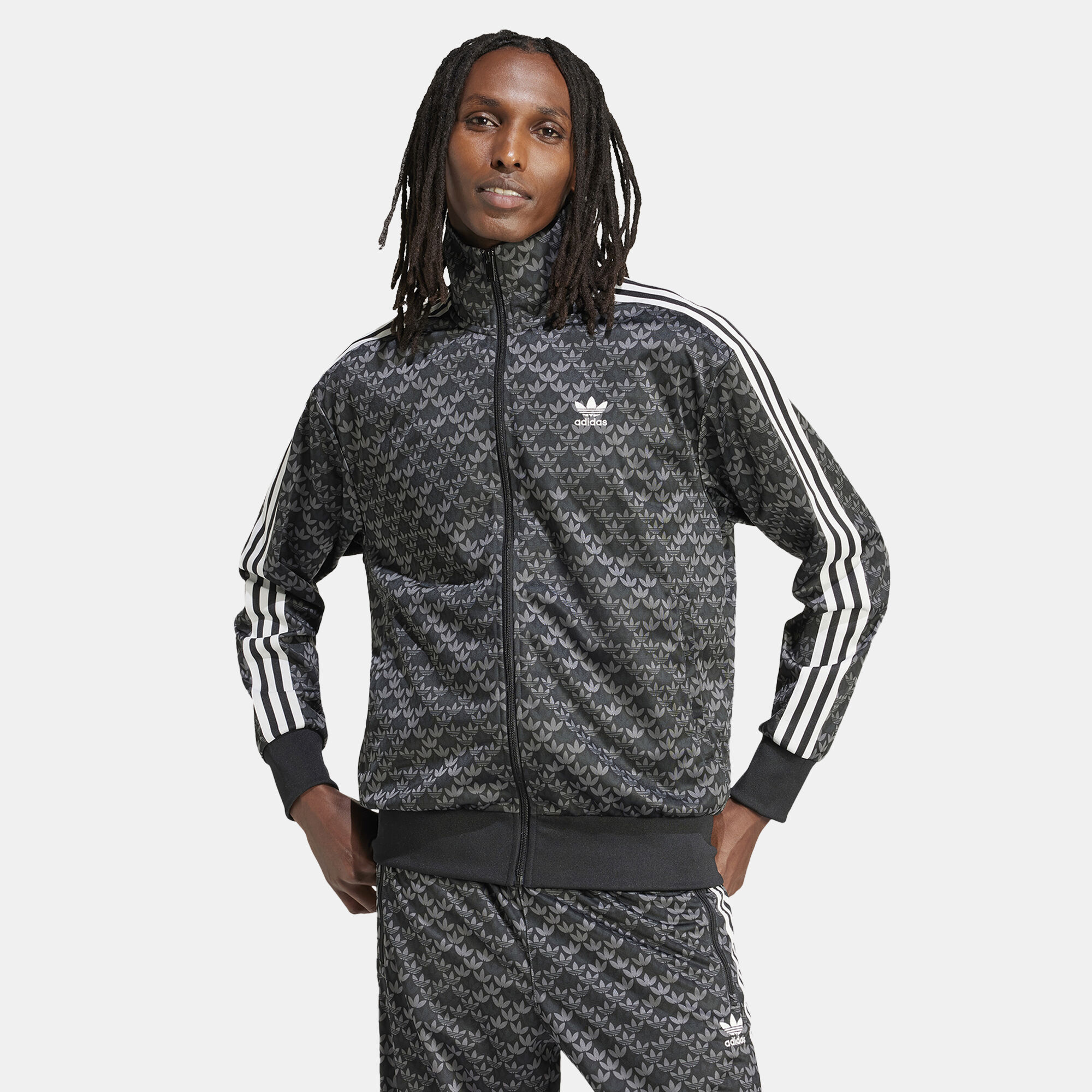 Buy adidas Originals Men s Firebird Classic Mono Track Top Black in Kuwait SSS