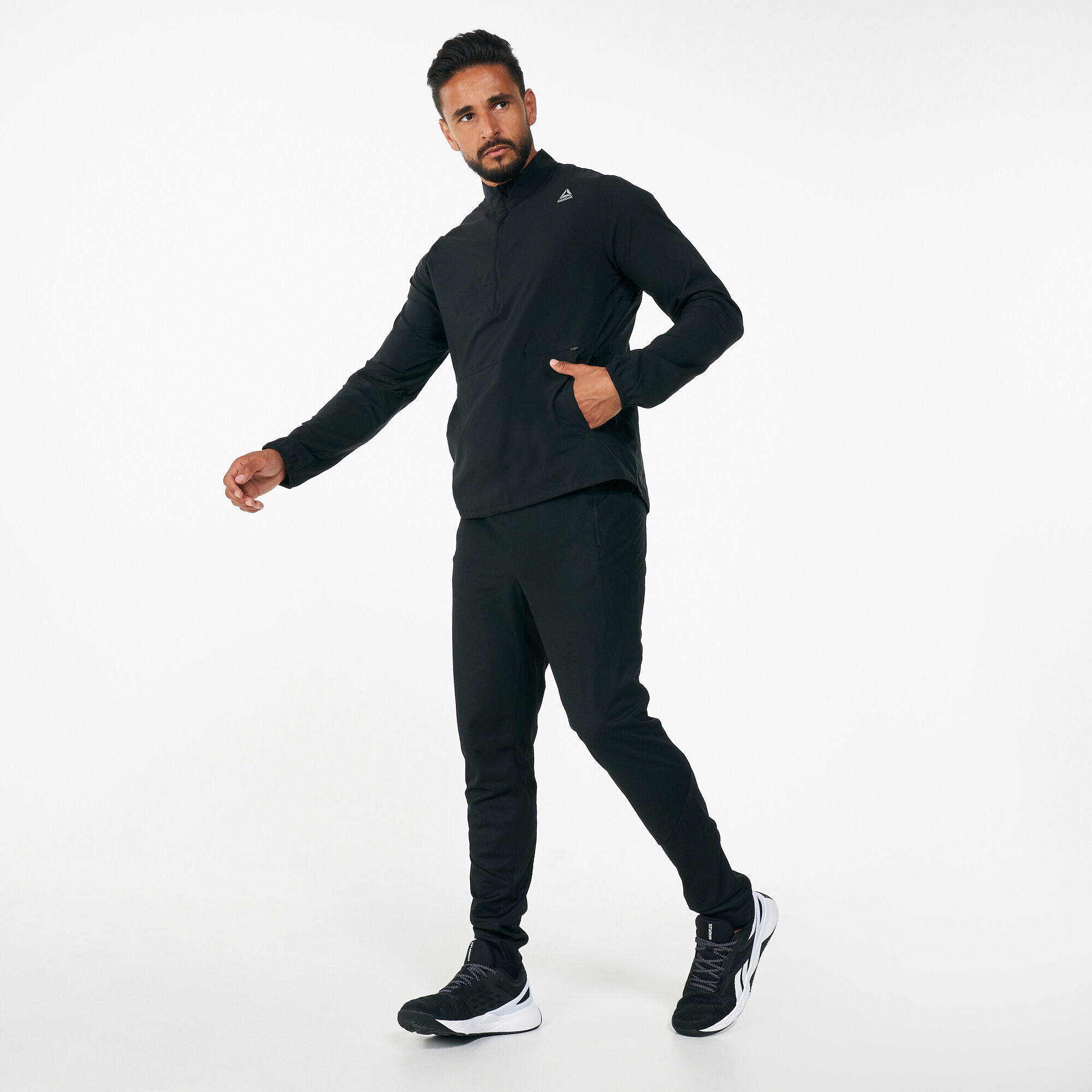 Men s Essentials Woven Running Wind Jacket Black Reebok in Kuwait SSS