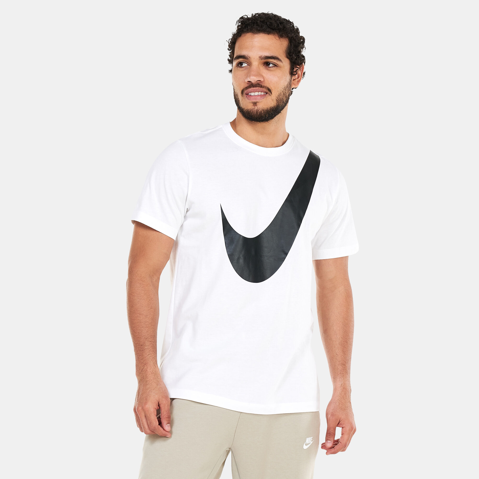 Nike large swoosh t shirt 2025