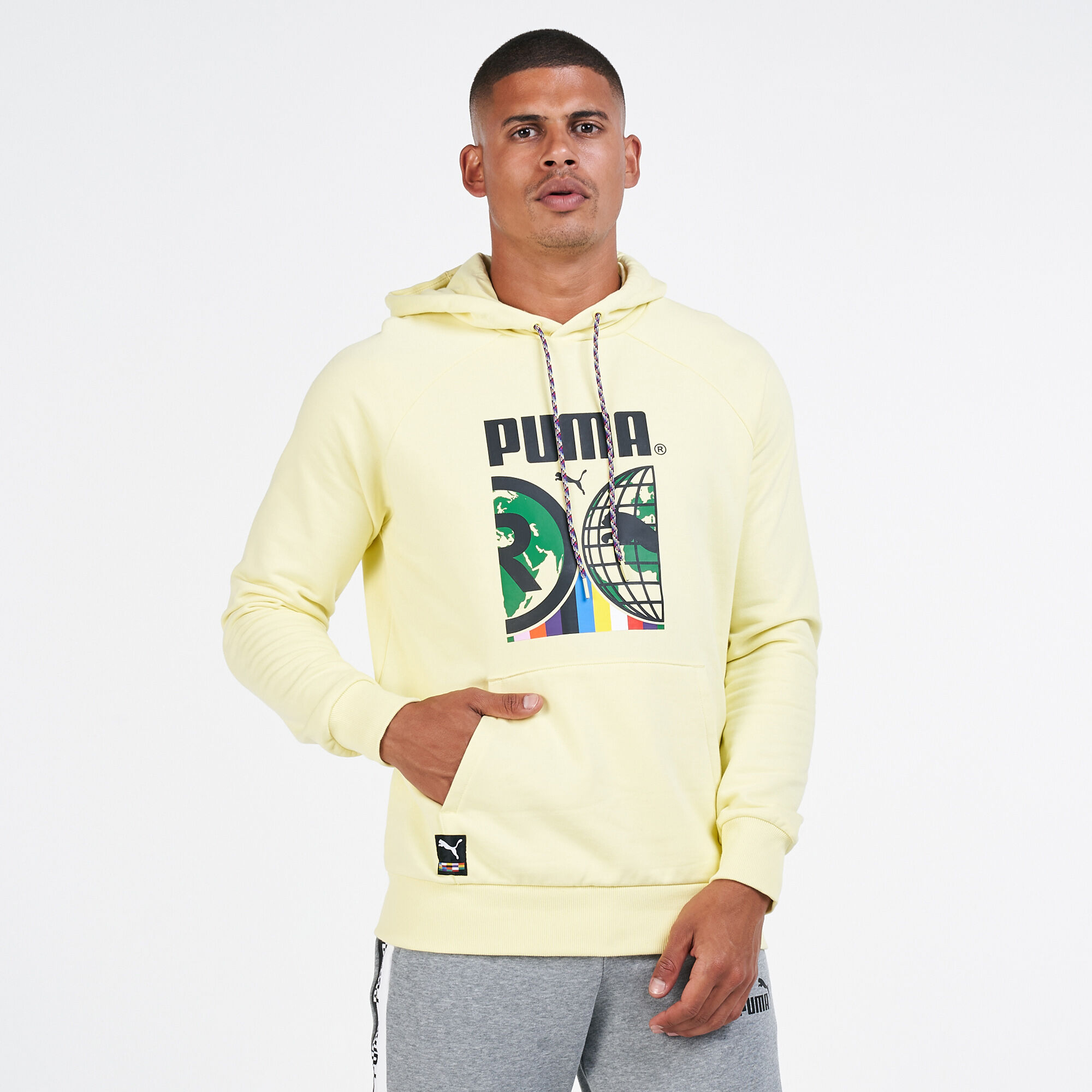 Buy PUMA Men s International Graphic Hoodie Yellow in Kuwait SSS