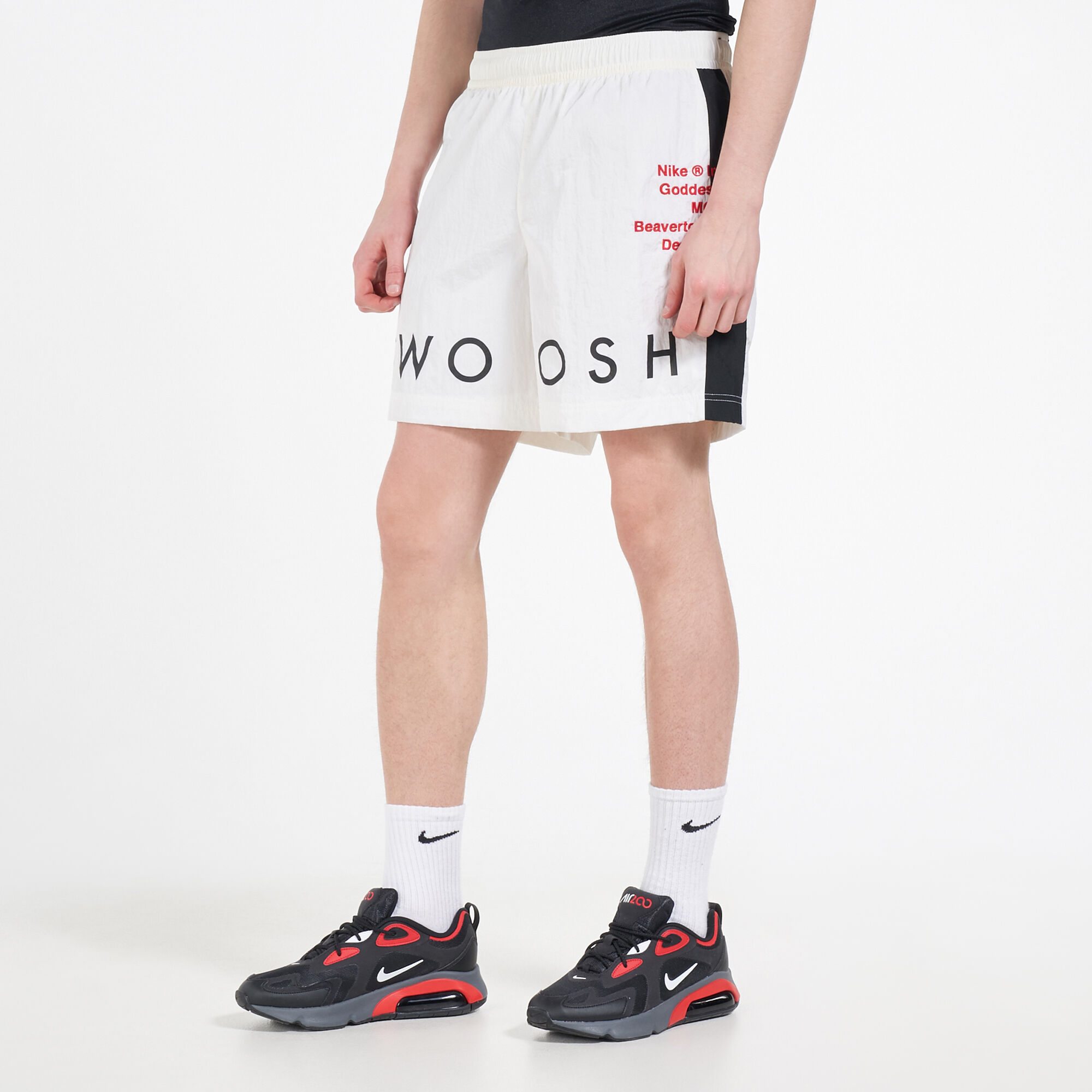 Nike sportswear hotsell swoosh woven shorts