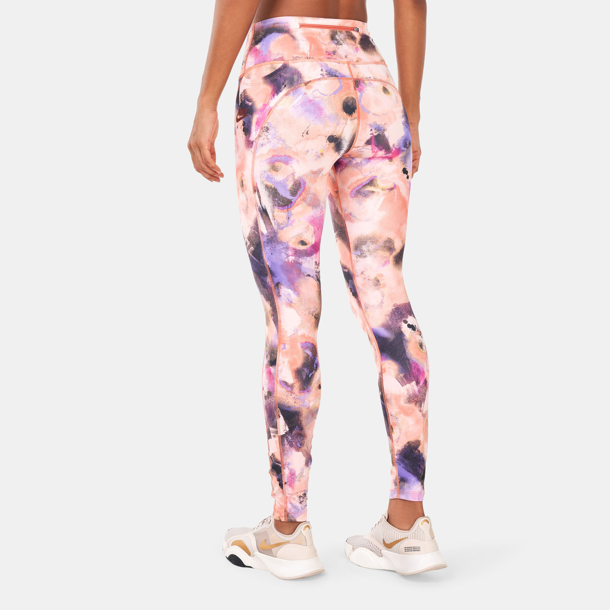 Women s Air Dri FIT Mid Rise 7 8 Printed Running Leggings Pink Nike in Kuwait SSS