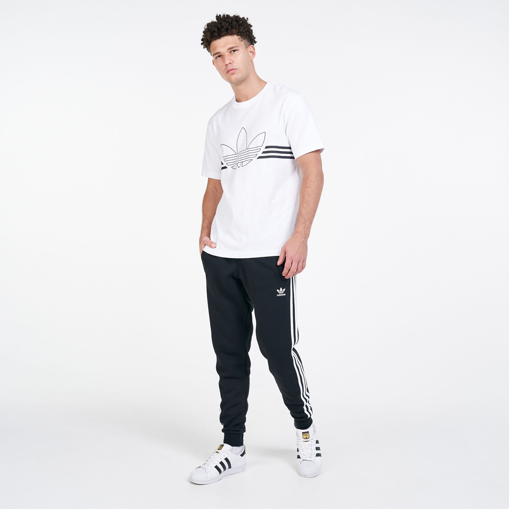 White adidas joggers with black stripes online