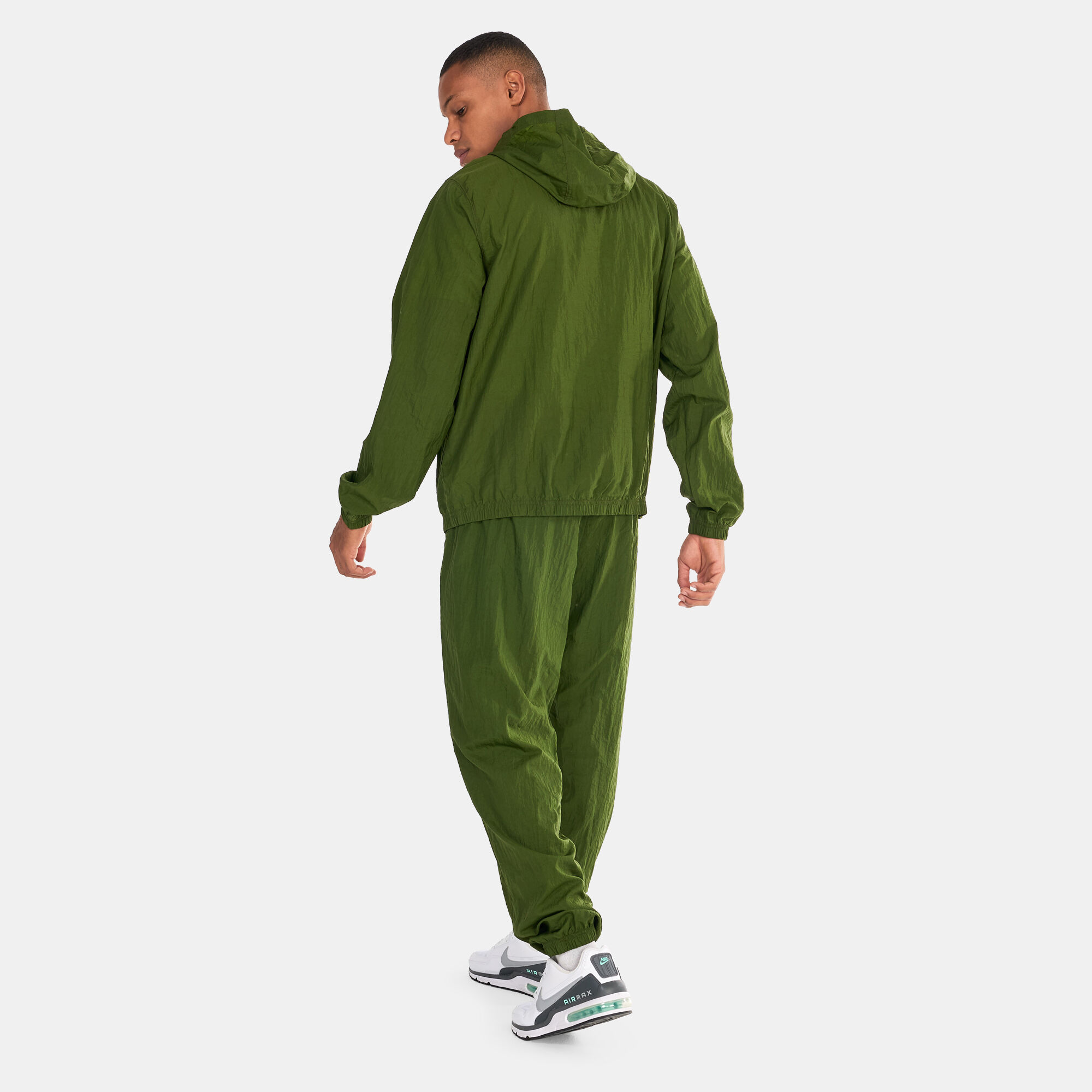 Nike woven tracksuit green store