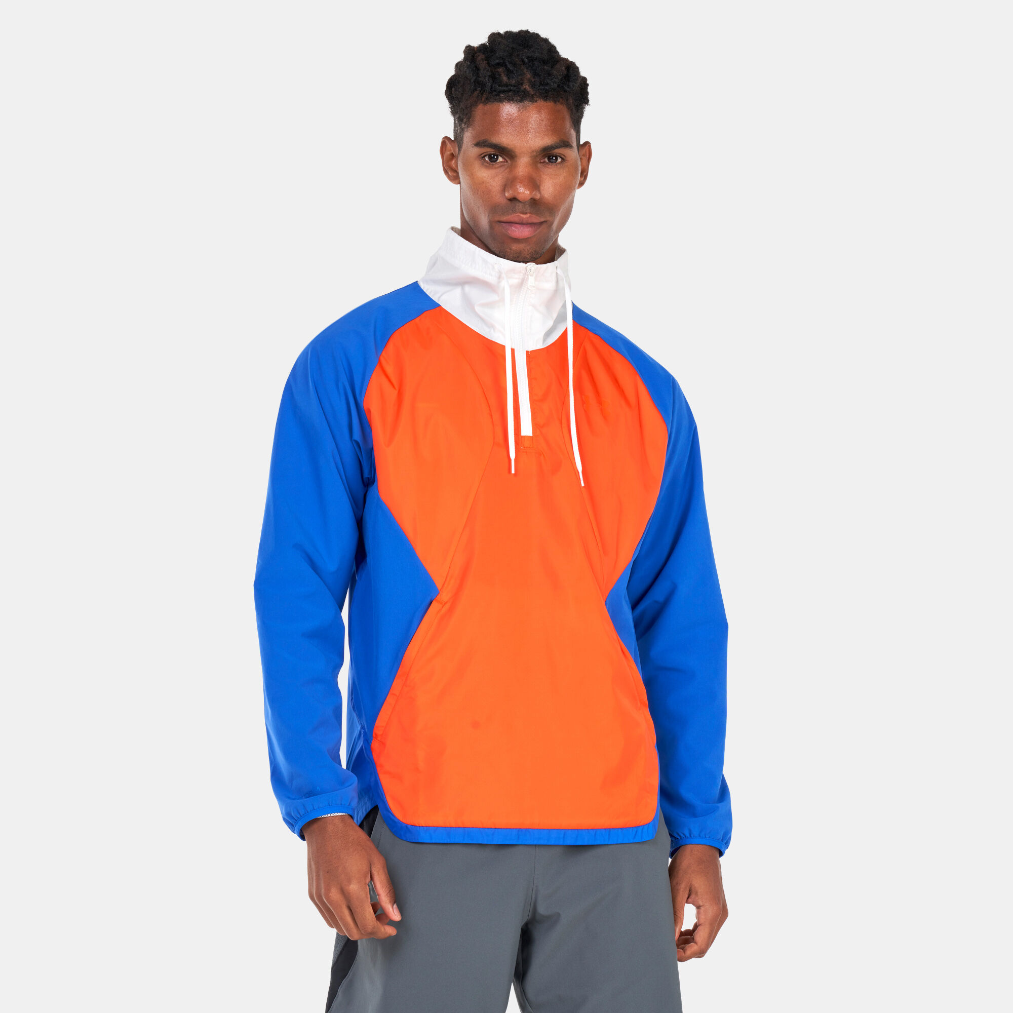 Buy Under Armour Men s Stretch Woven 1 2 Zip Jacket Blue in Kuwait