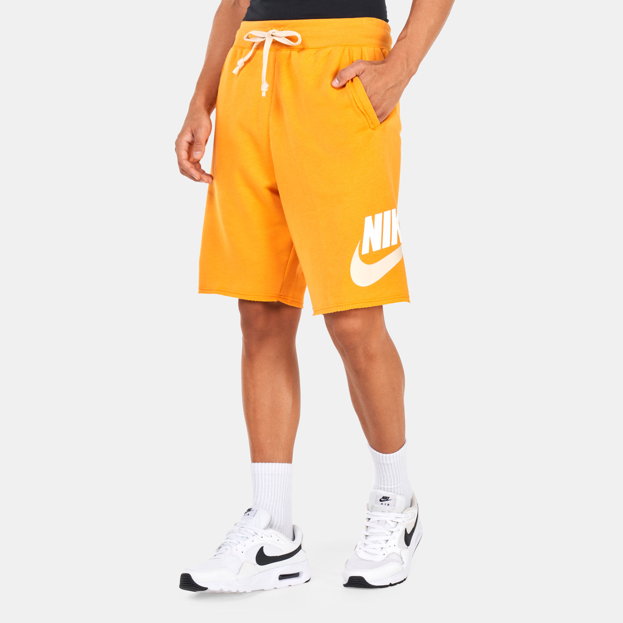 Men orange nike shorts top