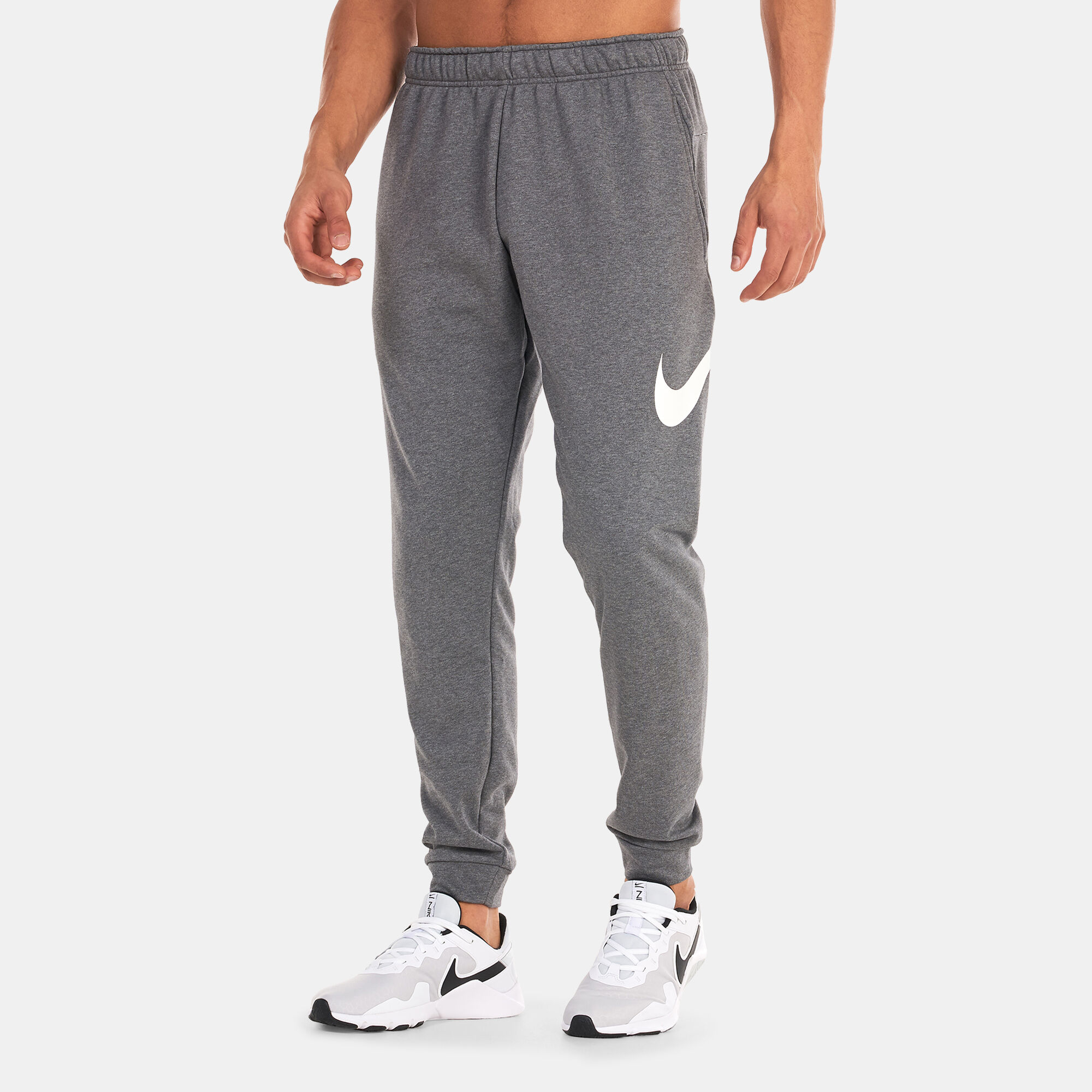 Men s Dri FIT Dry Graphic Tapered Training Pants Grey Nike in Kuwait SSS