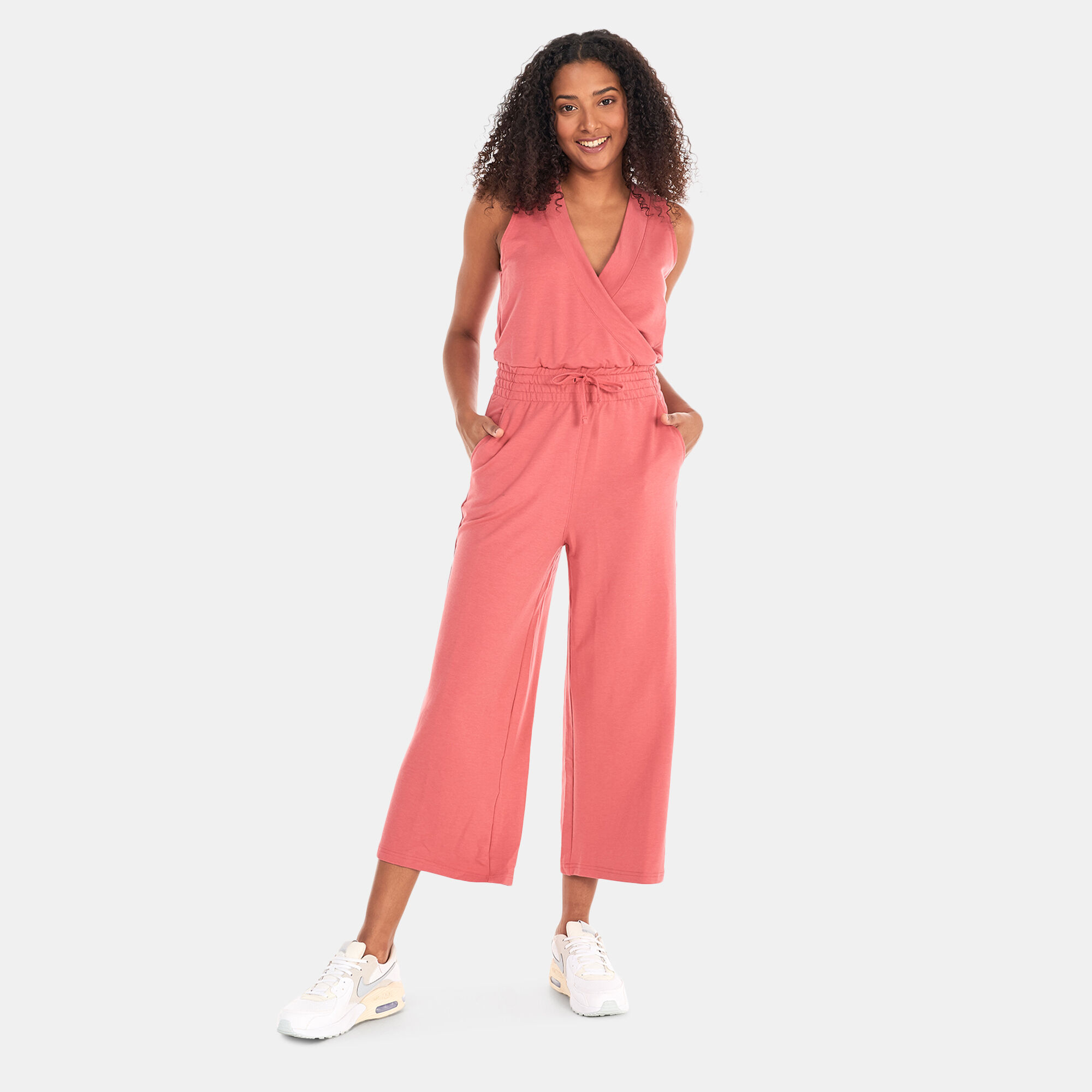 Women s Yoga Dri FIT French Terry Jumpsuit Pink Nike in Kuwait SSS