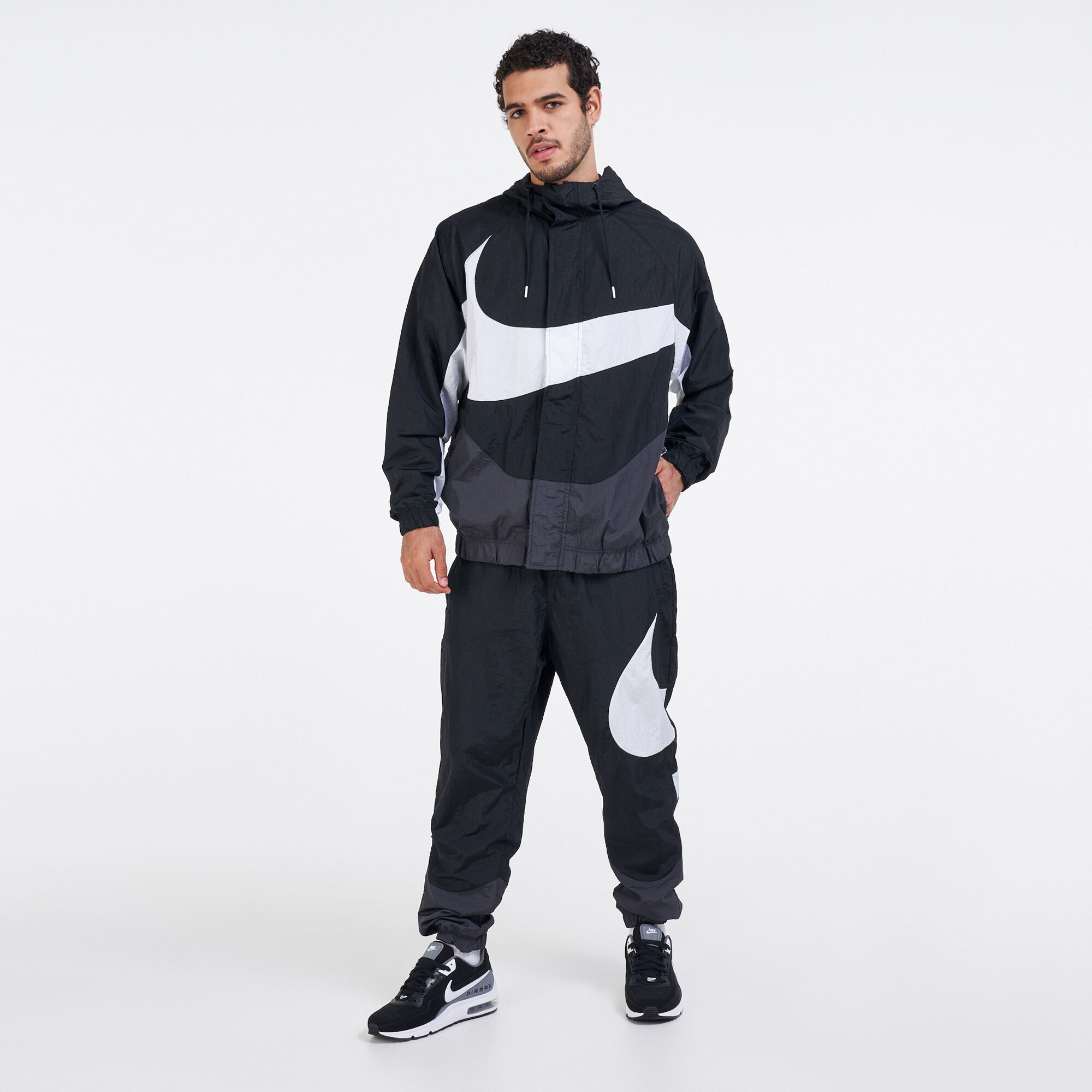 Swoosh woven pant top