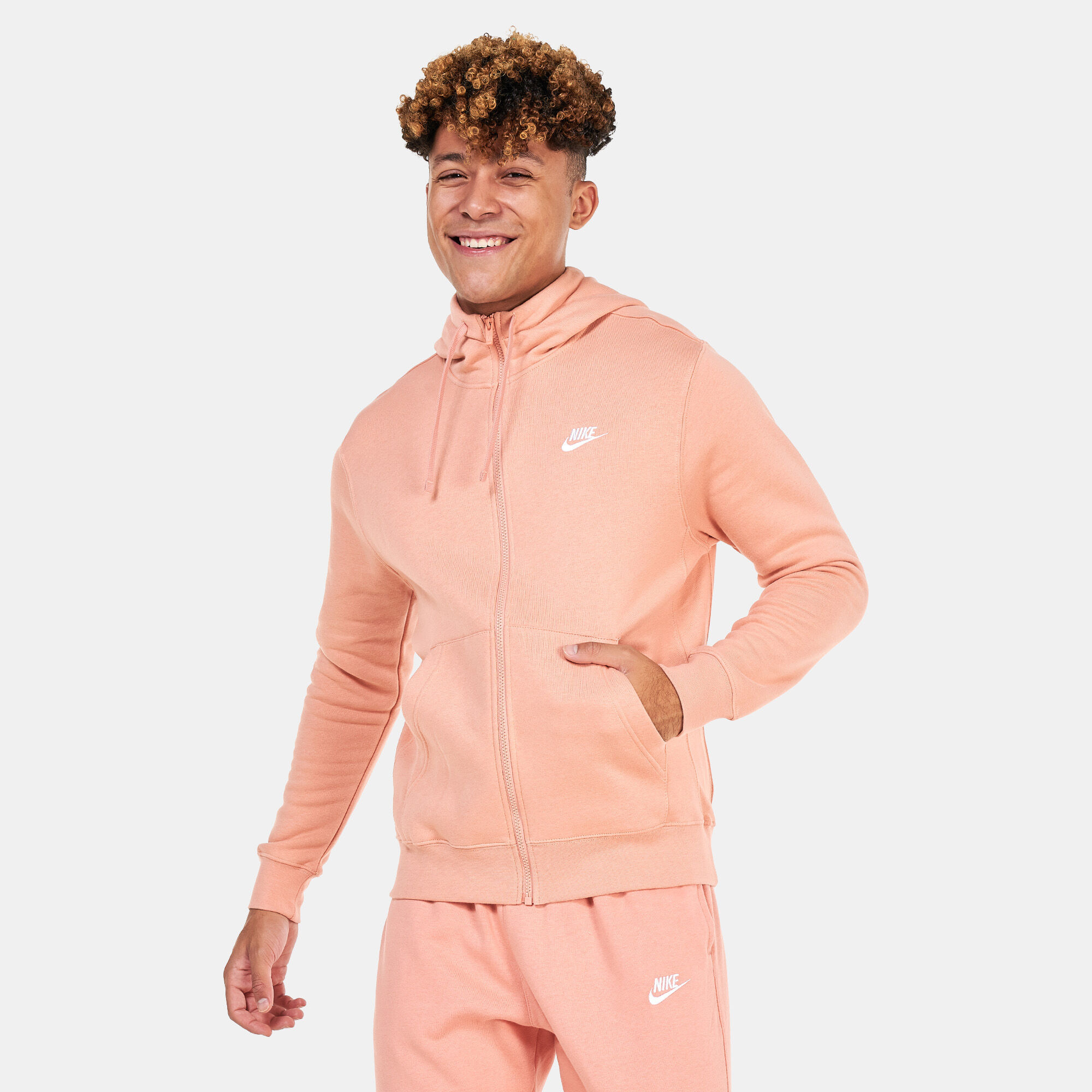Mens pink nike tracksuit sales