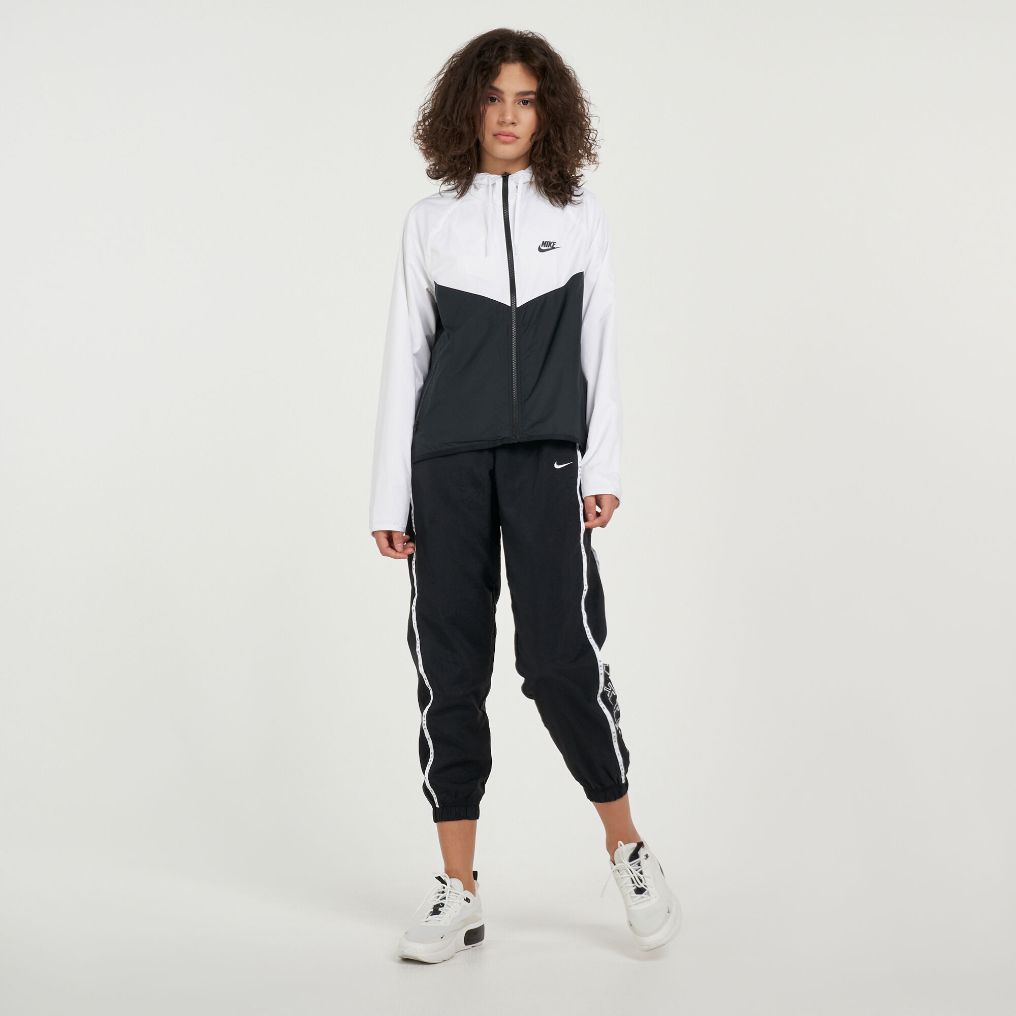 Women's windrunner jacket black and white sale