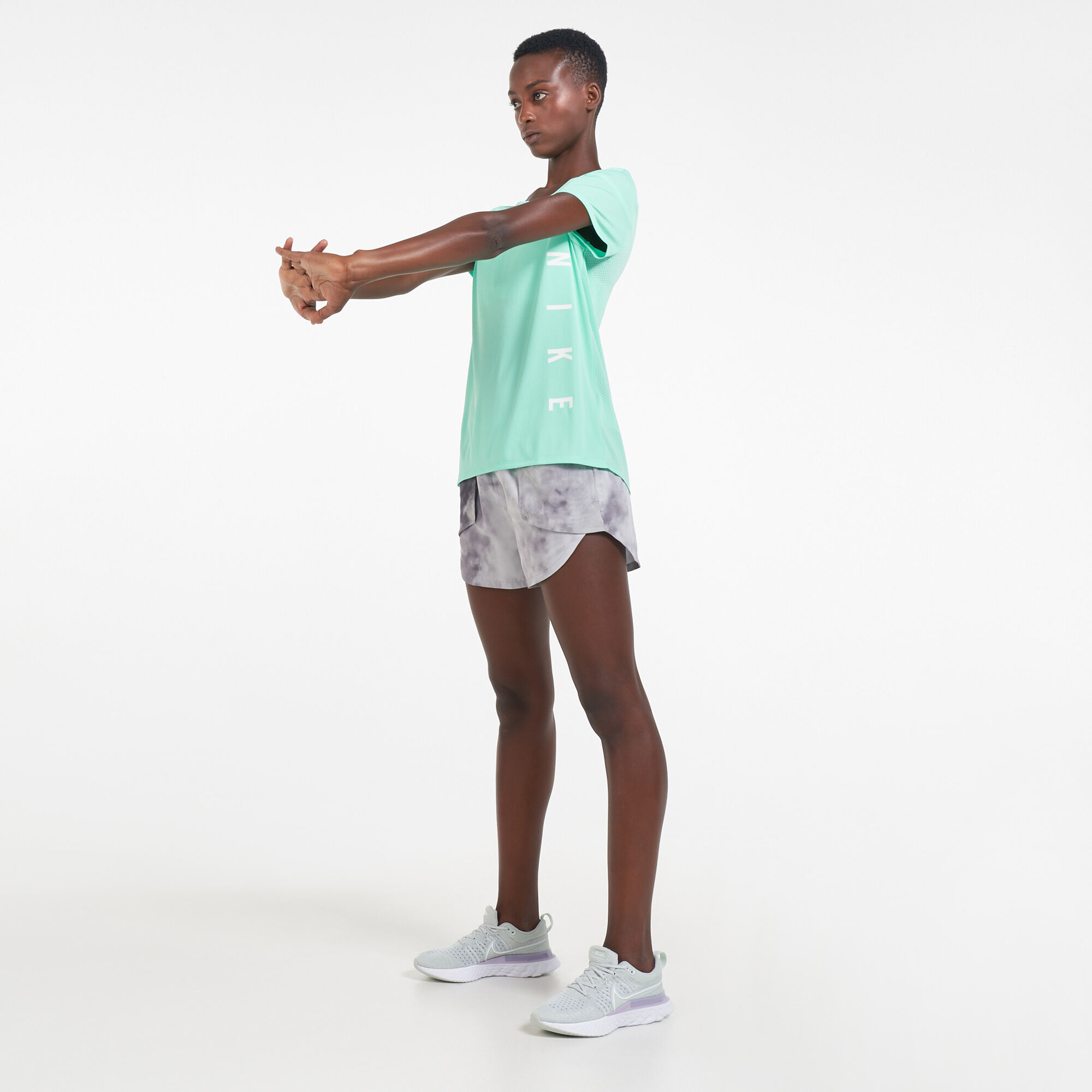 Nike women's miler top deals