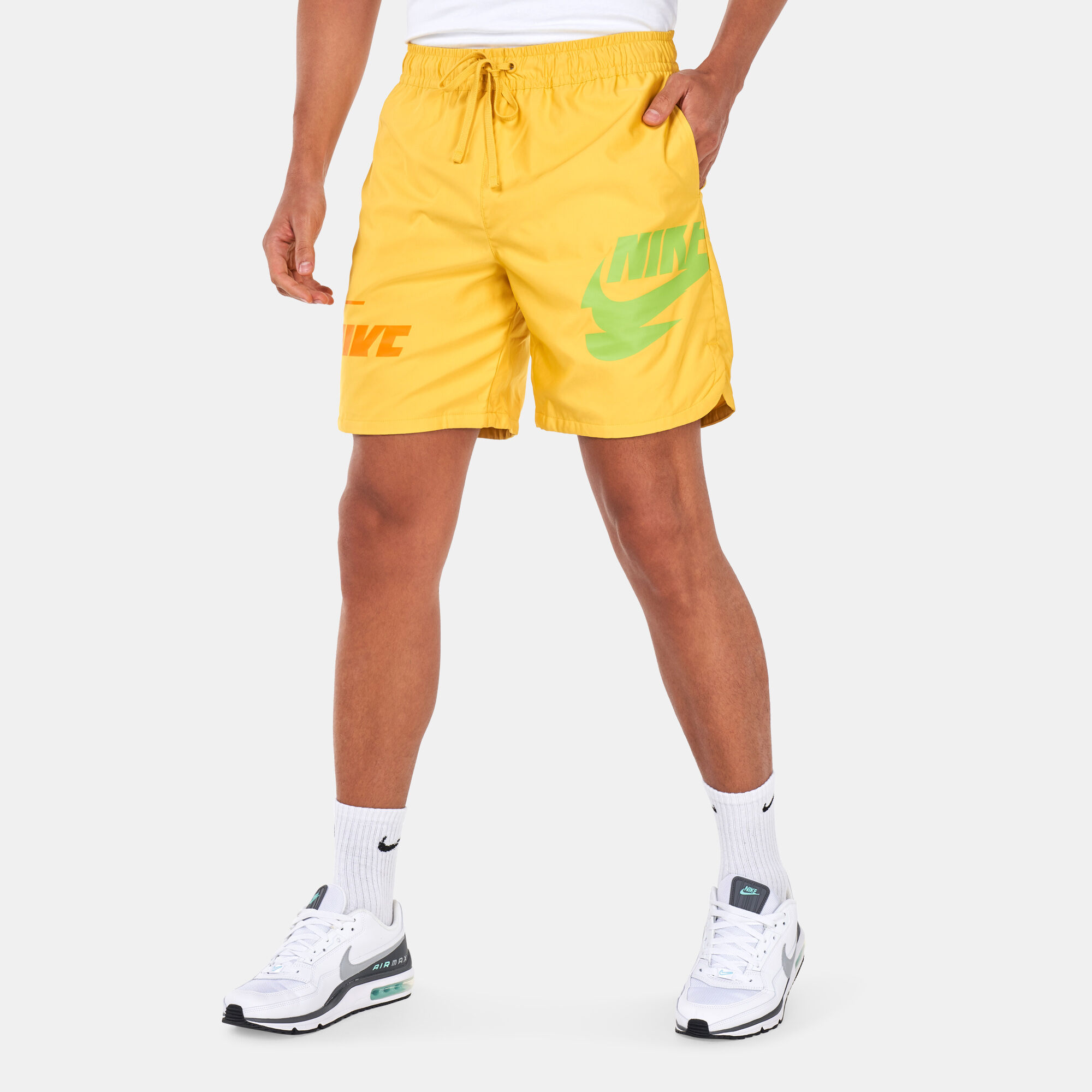 Men s Sportswear Sport Essentials Woven Shorts Yellow Nike in Kuwait SSS