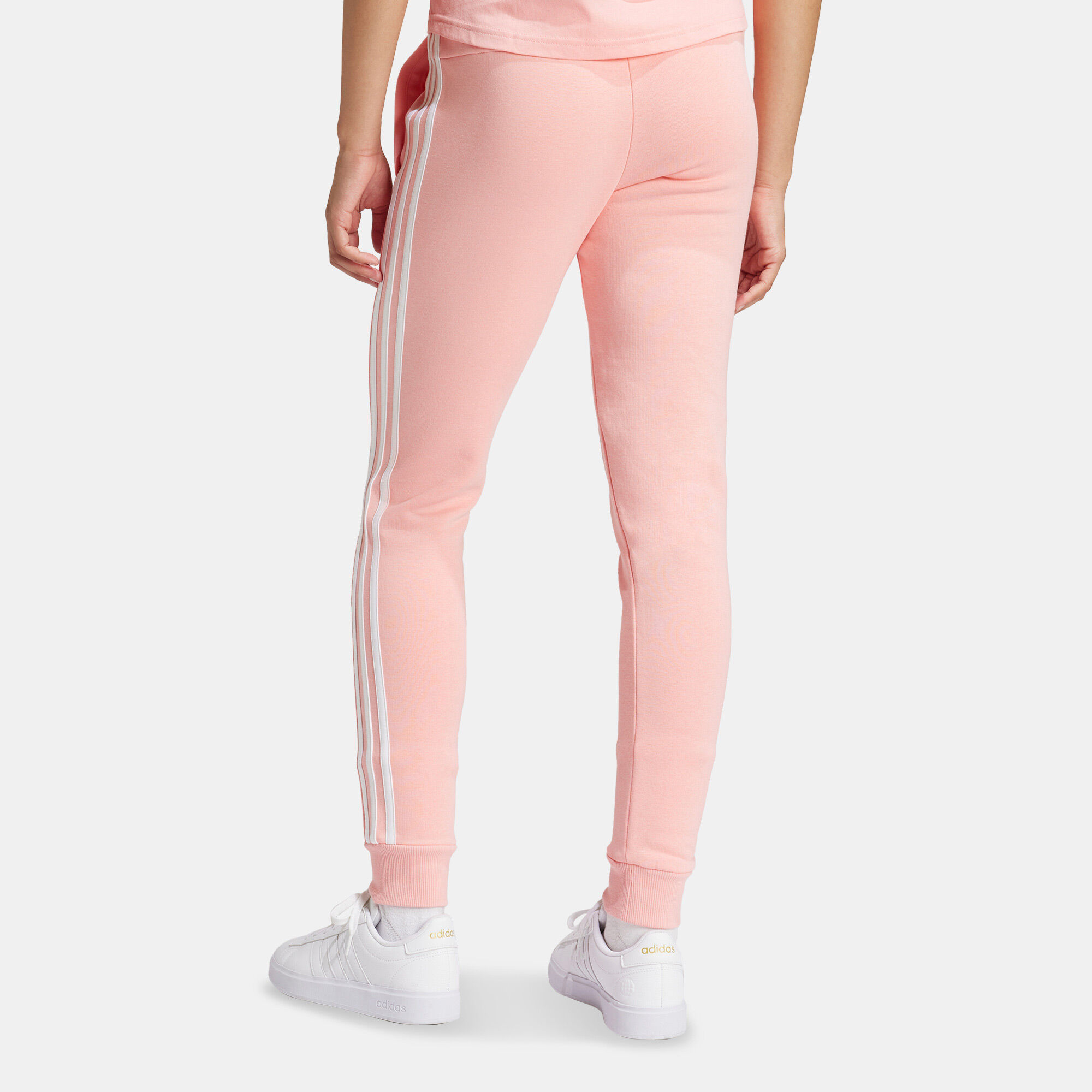 Women s Essentials 3 Stripes Fleece Pants Pink adidas in Kuwait SSS