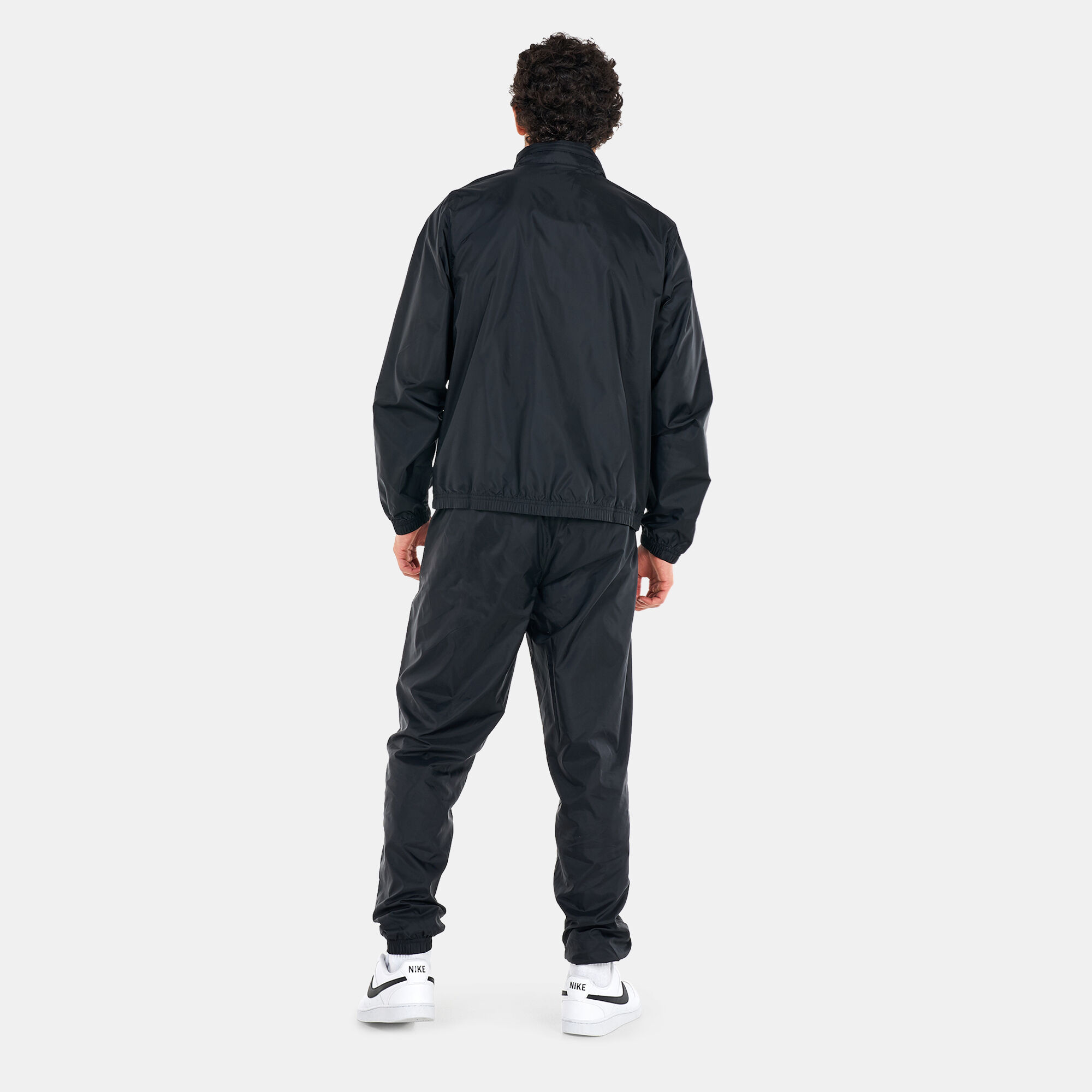 Nike woven tracksuit black best sale