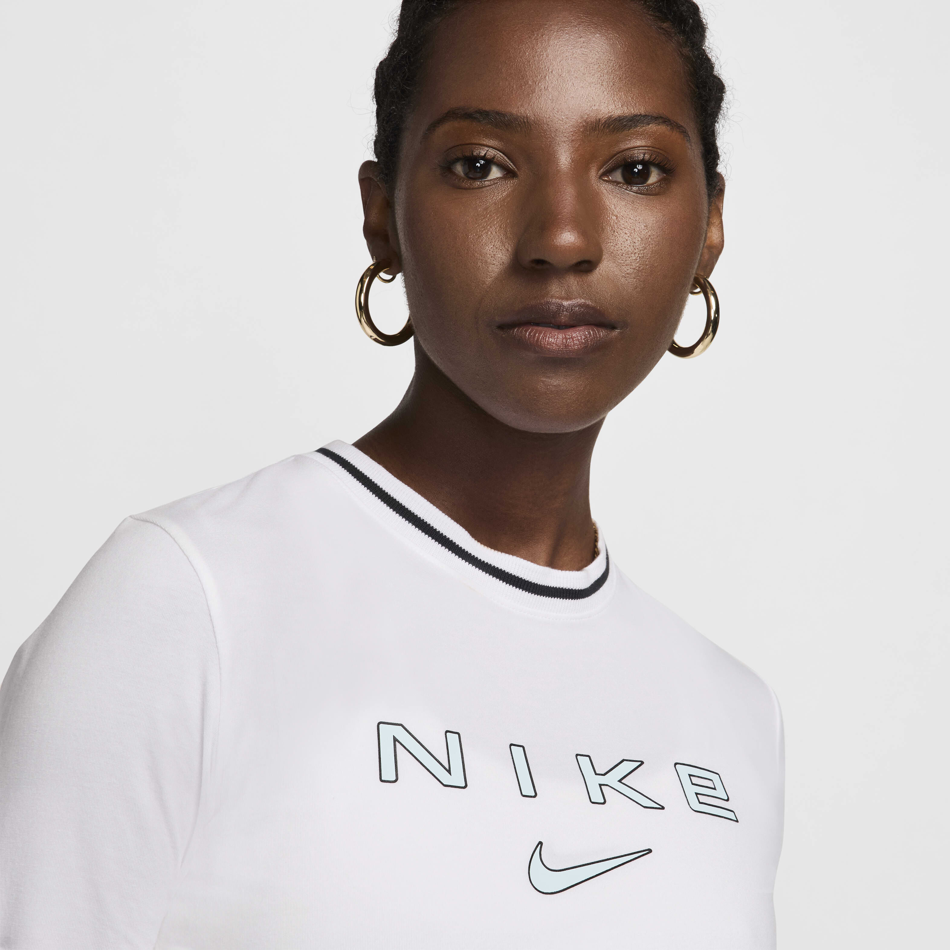 Nike graphic tees womens best sale