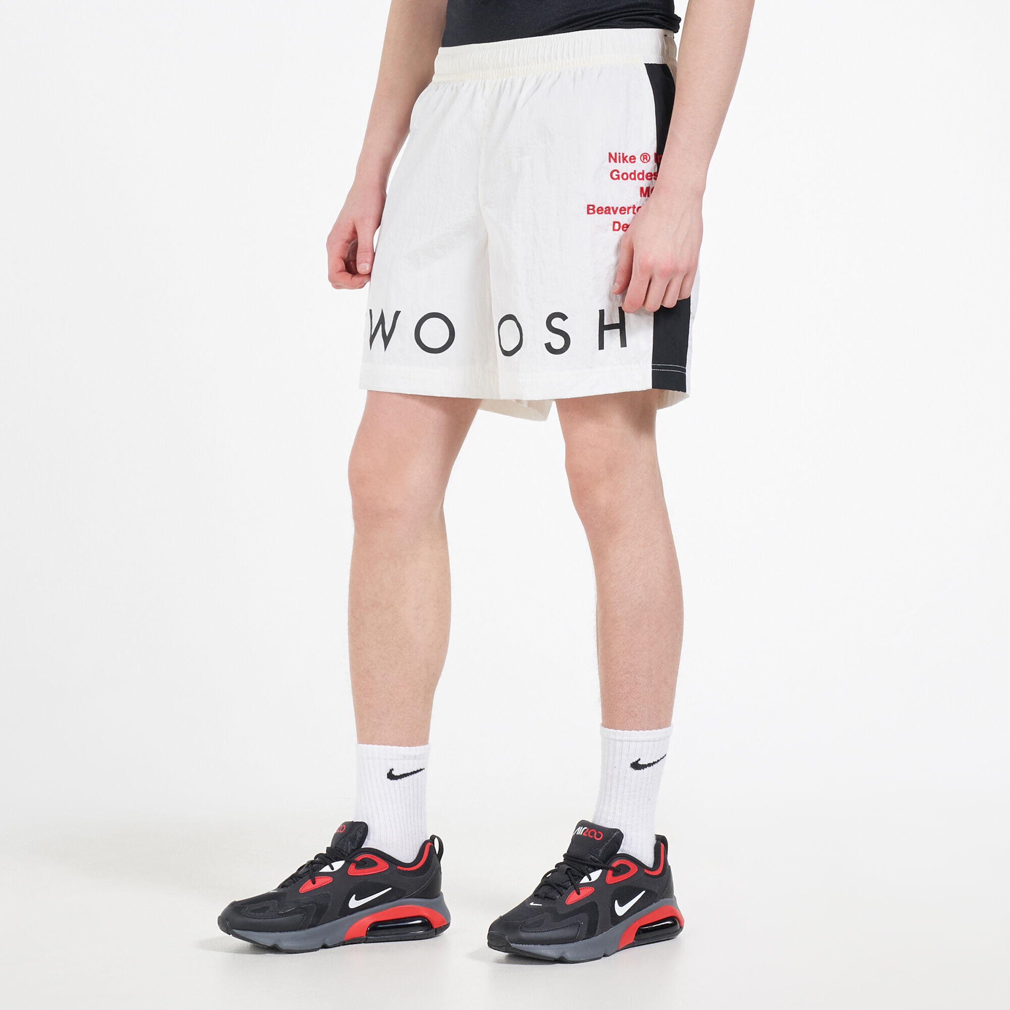 swoosh woven shorts