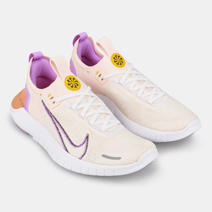 Nike Women's Free RN NN Road Running Shoes Pink image number 1