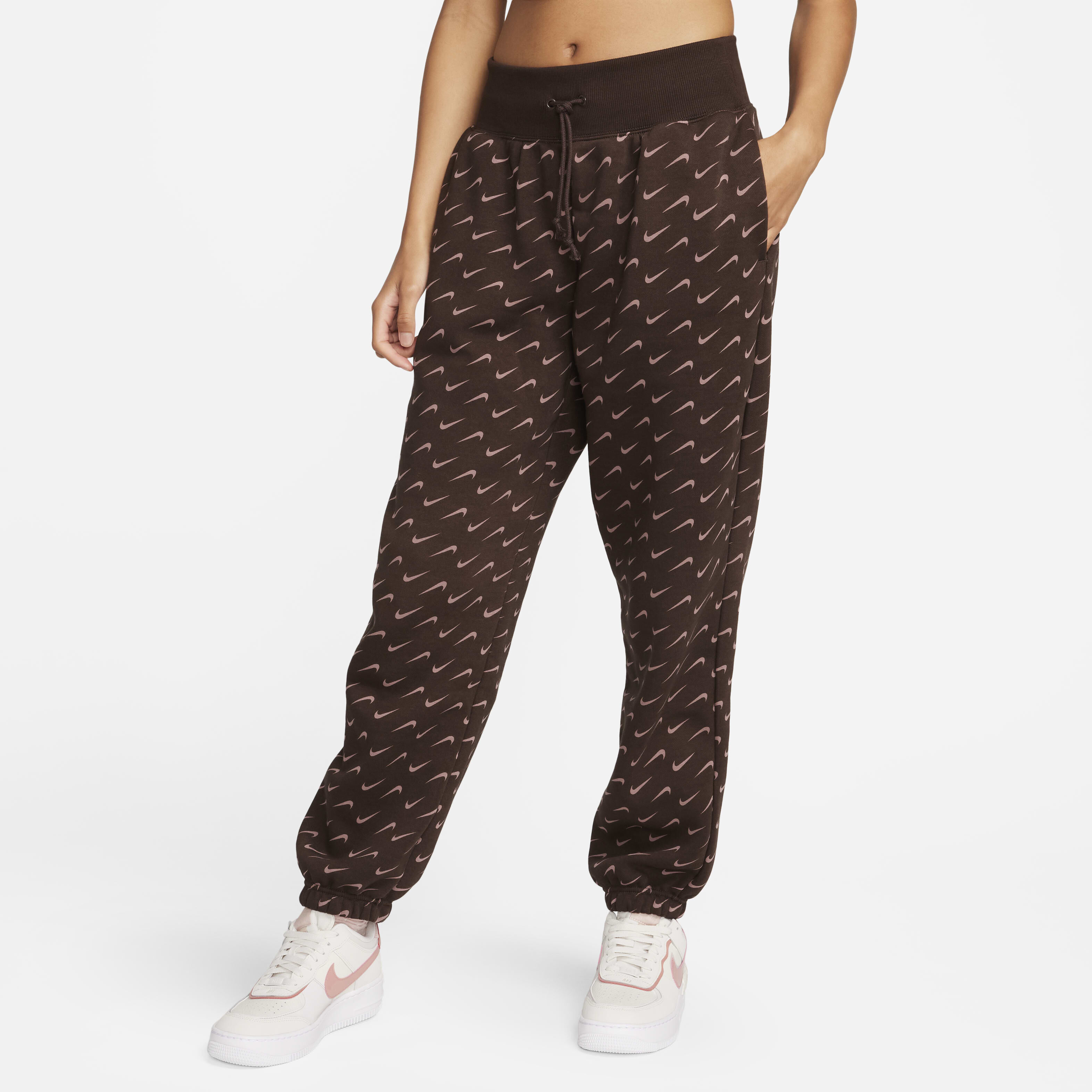 Women s Sportswear Phoenix Fleece Oversized Printed Tracksuit Bottoms Brown Nike in Kuwait SSS