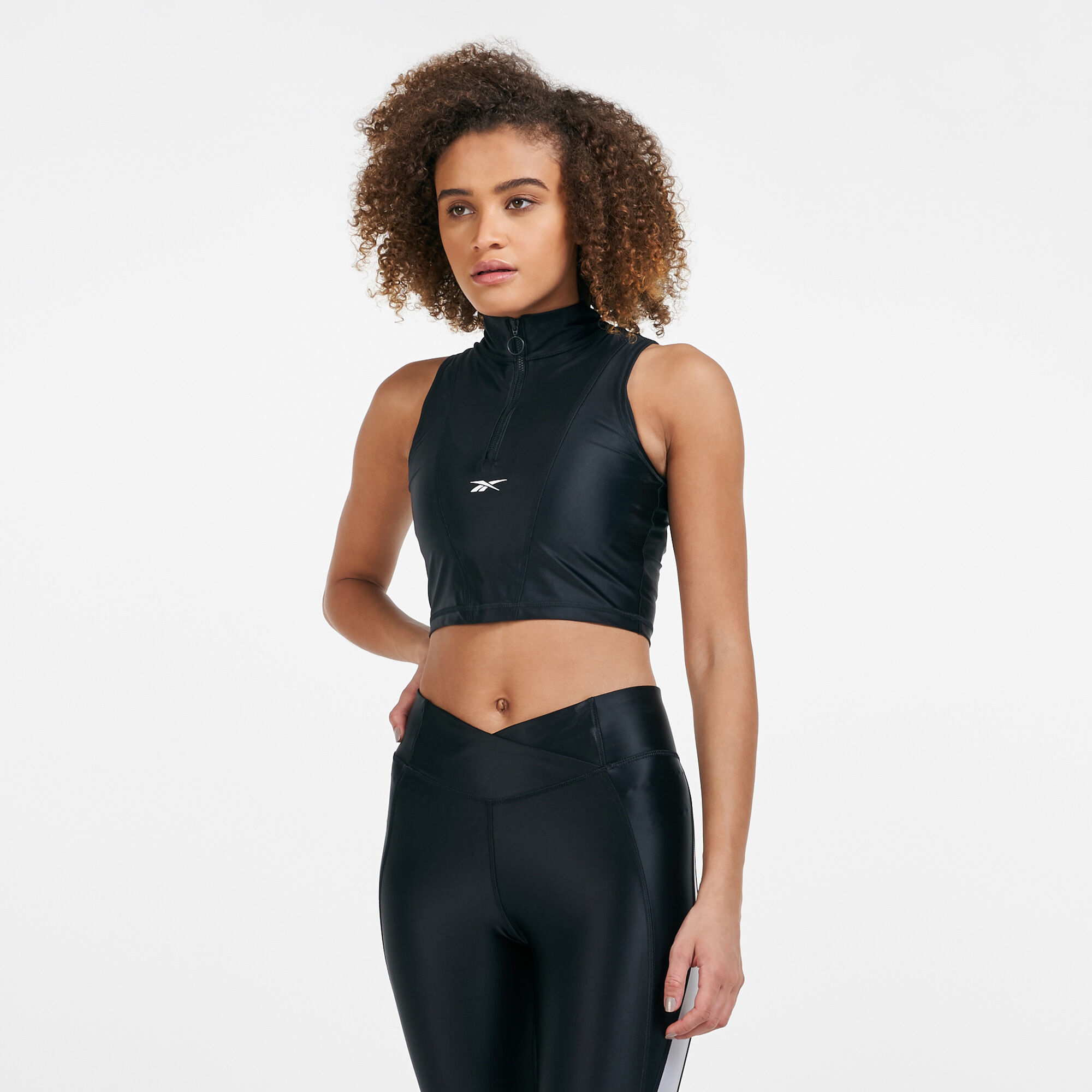 Buy Reebok Women s Shiny Lycra Zipped Cropped Tank Top Black in
