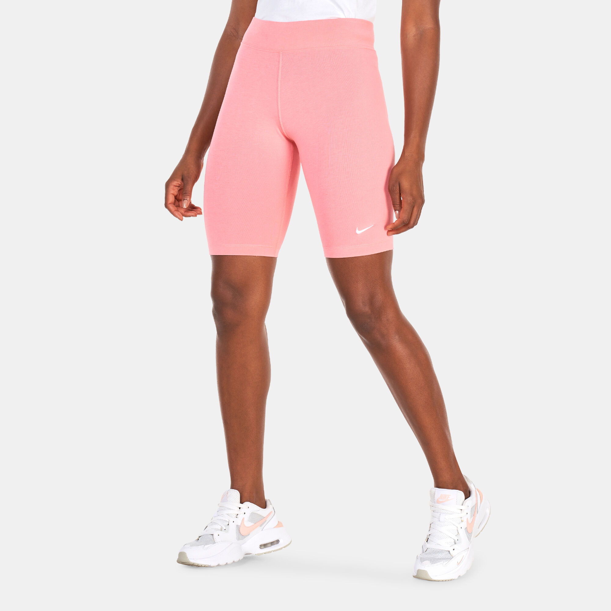 Women s Sportswear Essential Mid Rise Biker Shorts Pink Nike in Kuwait SSS