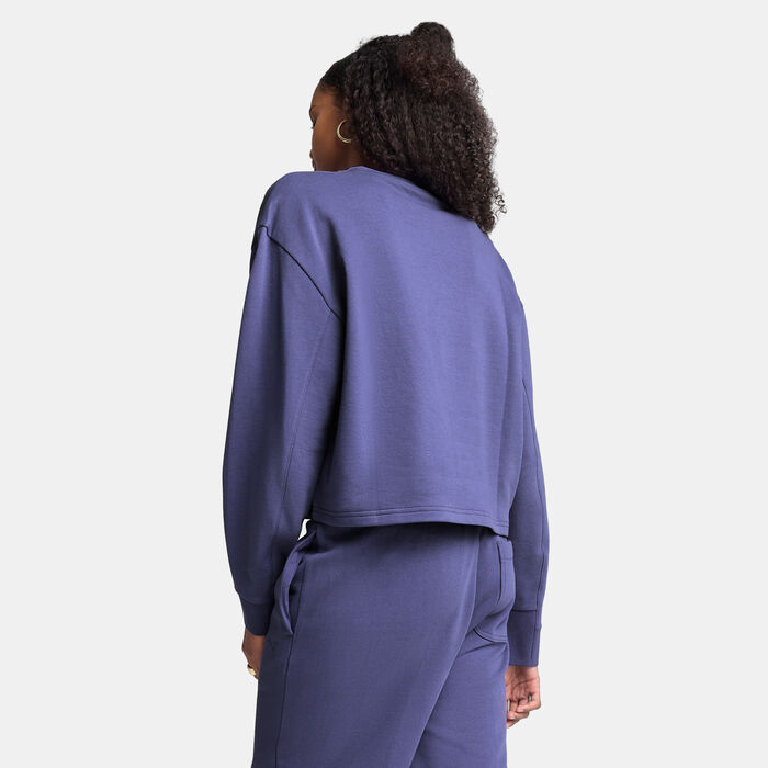 PUMA Women's HER Sweatshirt Purple image number 1