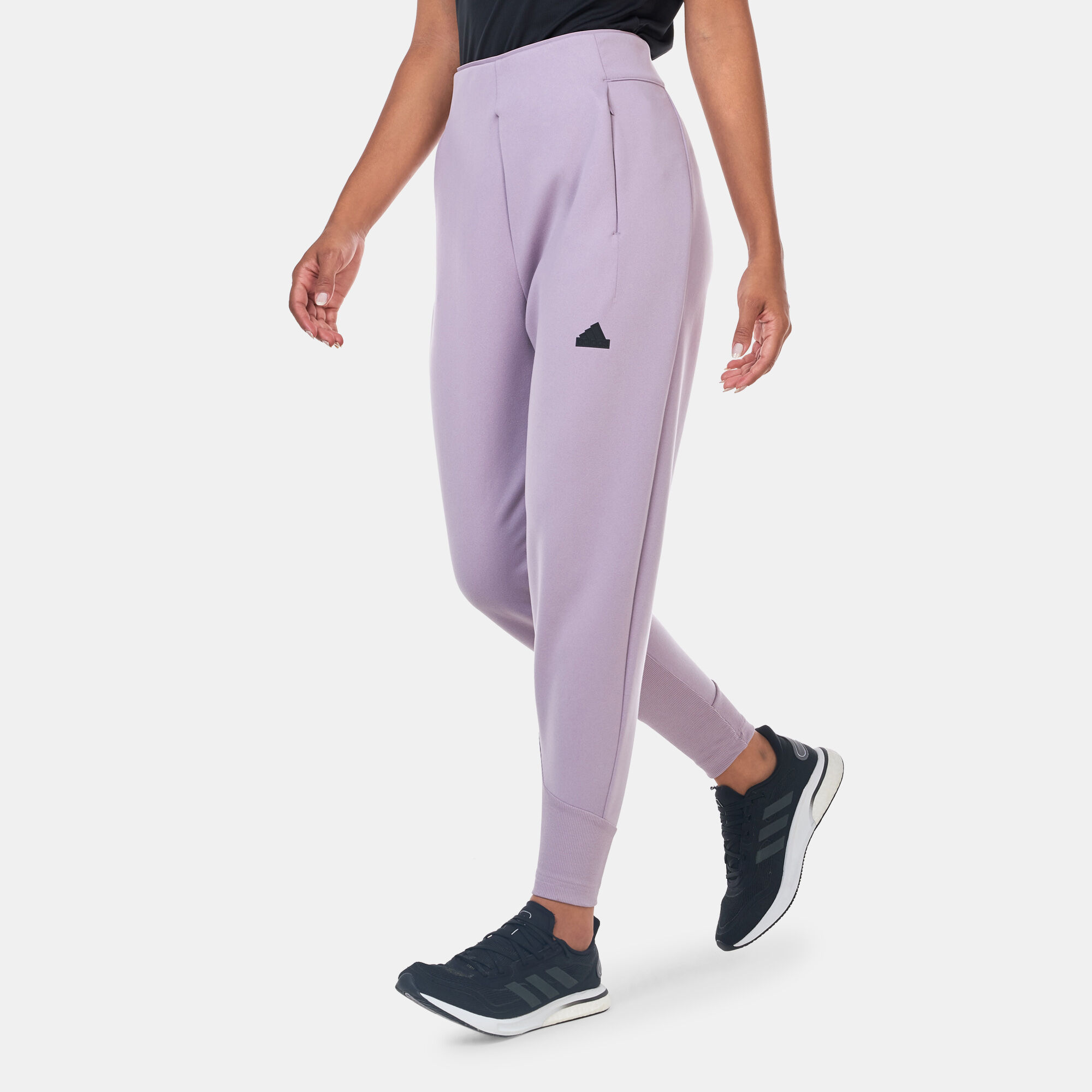 Buy adidas Women s Z.N.E. Winterized Training Joggers Purple in Kuwait SSS