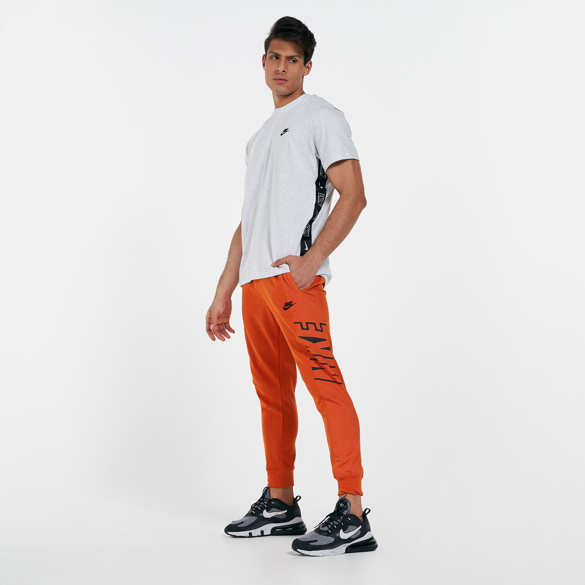 Nike orange sweatpants top