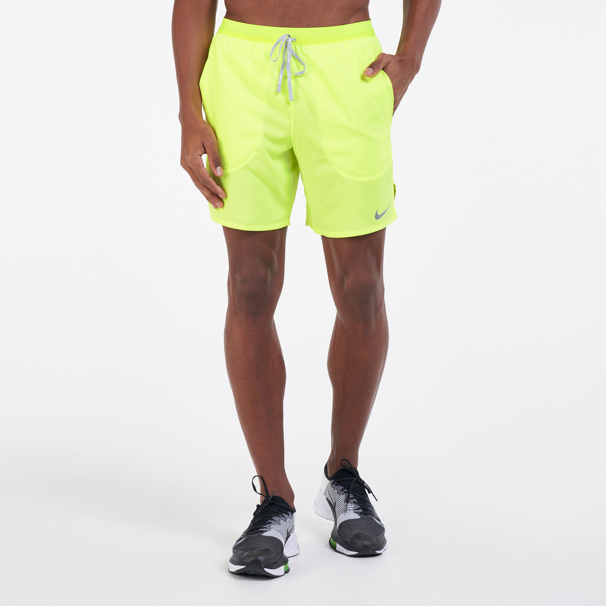 Men s Flex Stride 7 inch Shorts Yellow Nike in Kuwait SSS