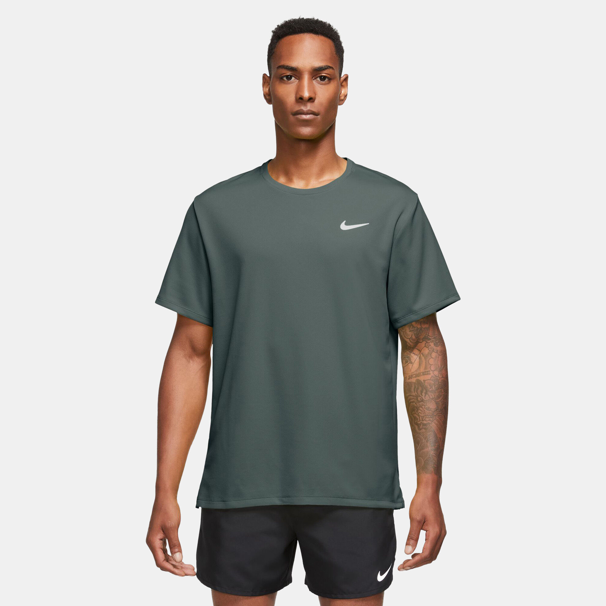 Men s Miler Dri FIT UV Running T Shirt Green Nike in Kuwait SSS