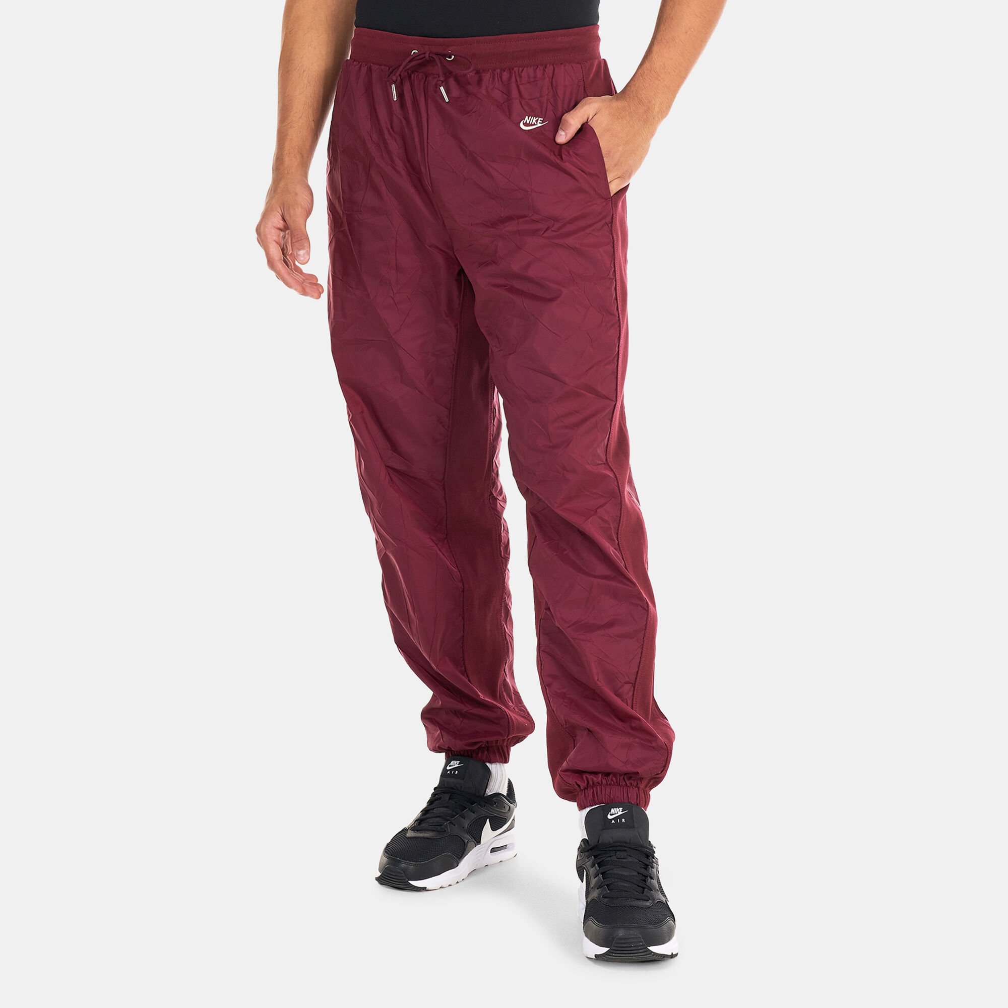 Maroon nike track pants shop