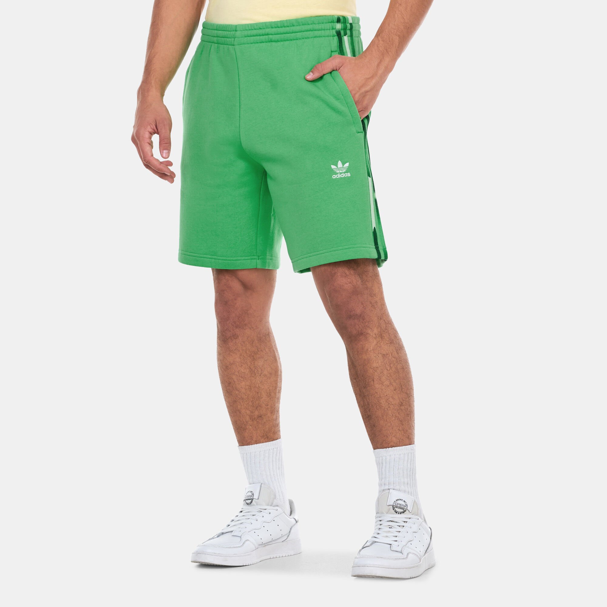 Adidas shorts green stripe online