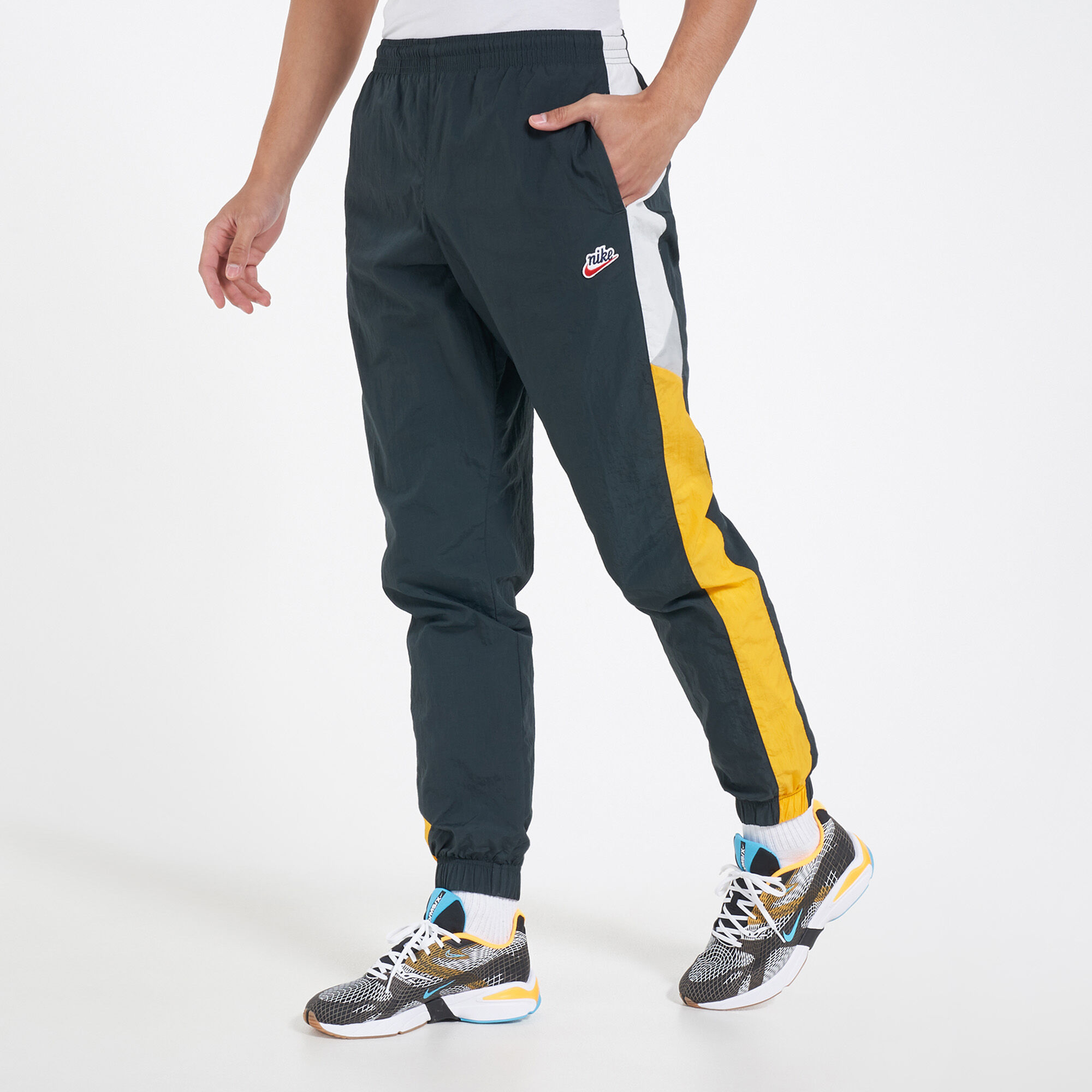 Men s Sportswear Heritage Woven Signature Joggers Green Nike in Kuwait SSS