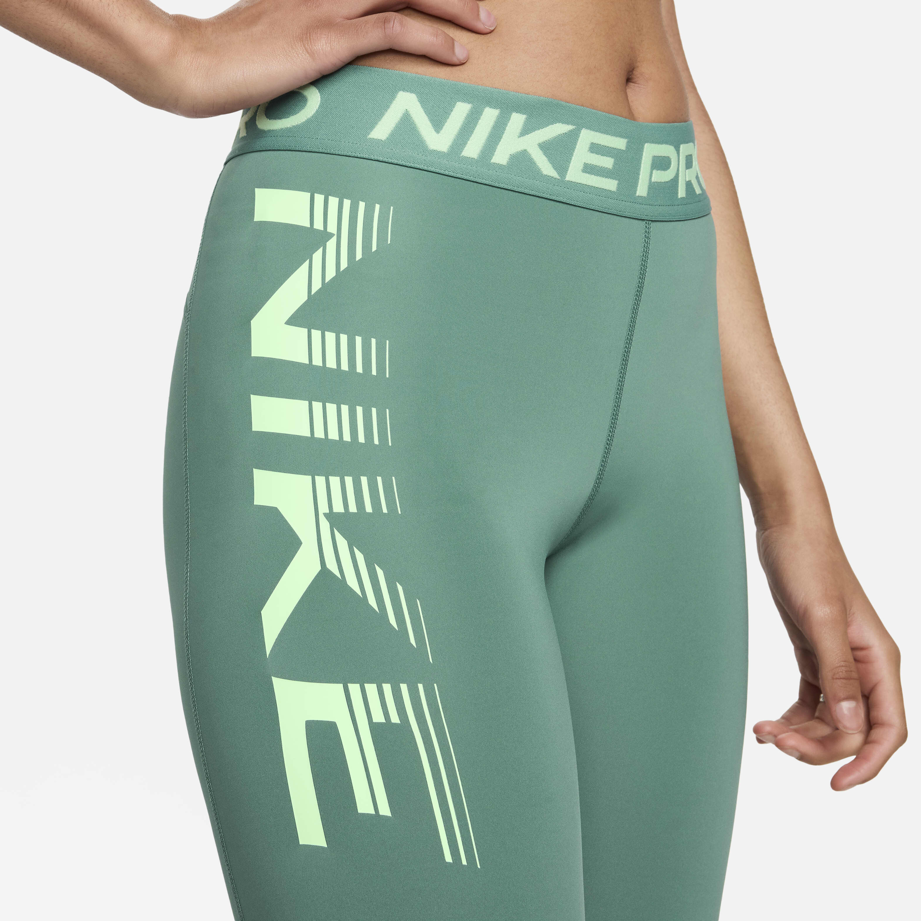 Women s Pro Mid Rise Graphic Leggings Green Nike in Kuwait SSS